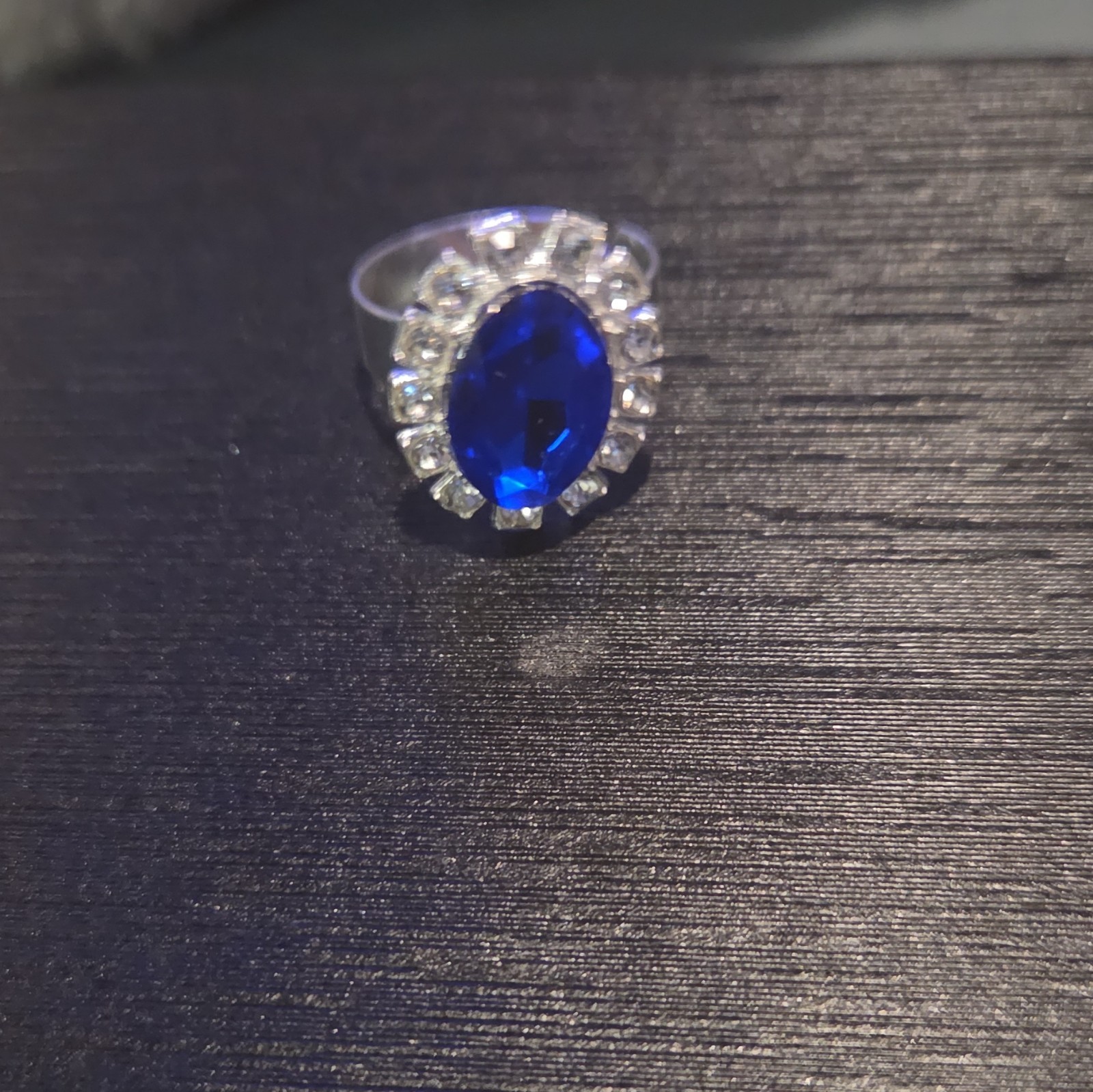 Silver Tone Cocktail Ring Size 8 Oval Blue Stone w/ Rhinestone Halo Accents