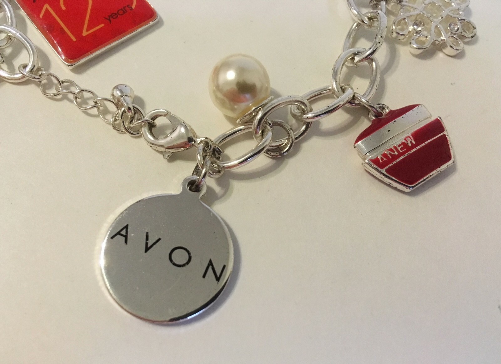 Avon 12 Charms Bracelet Silver Metal Link Chain 125 Years Anniversary Lipstick