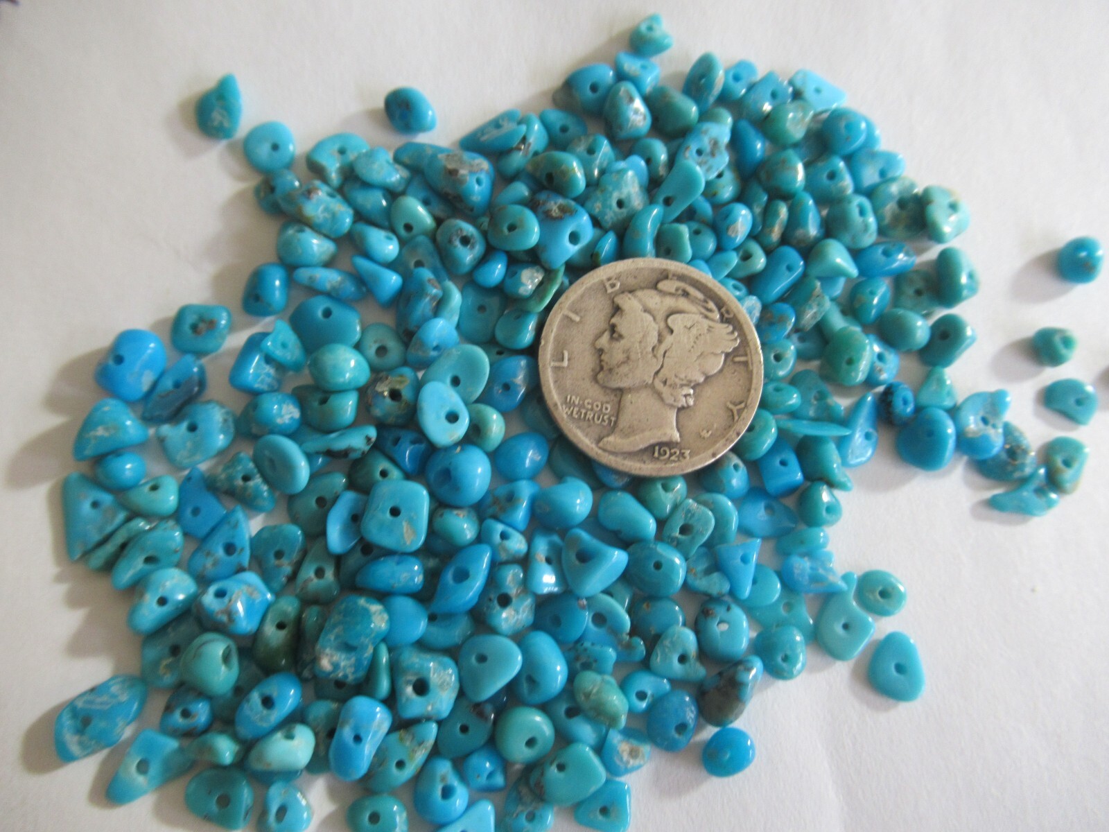 SLEEPING BEAUTY TURQUOISE 1/2 OZ DRILLED NUGGETS 4 X 3mm TO 7 X 4mm #606