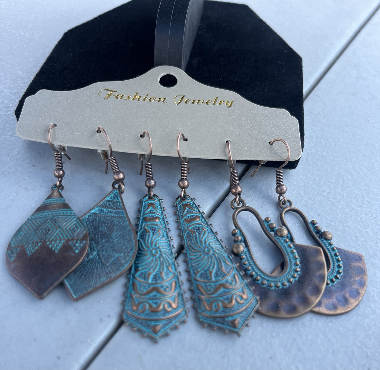 12 pair Bohemian dangle Turquoise/ bronze earrings- brand new