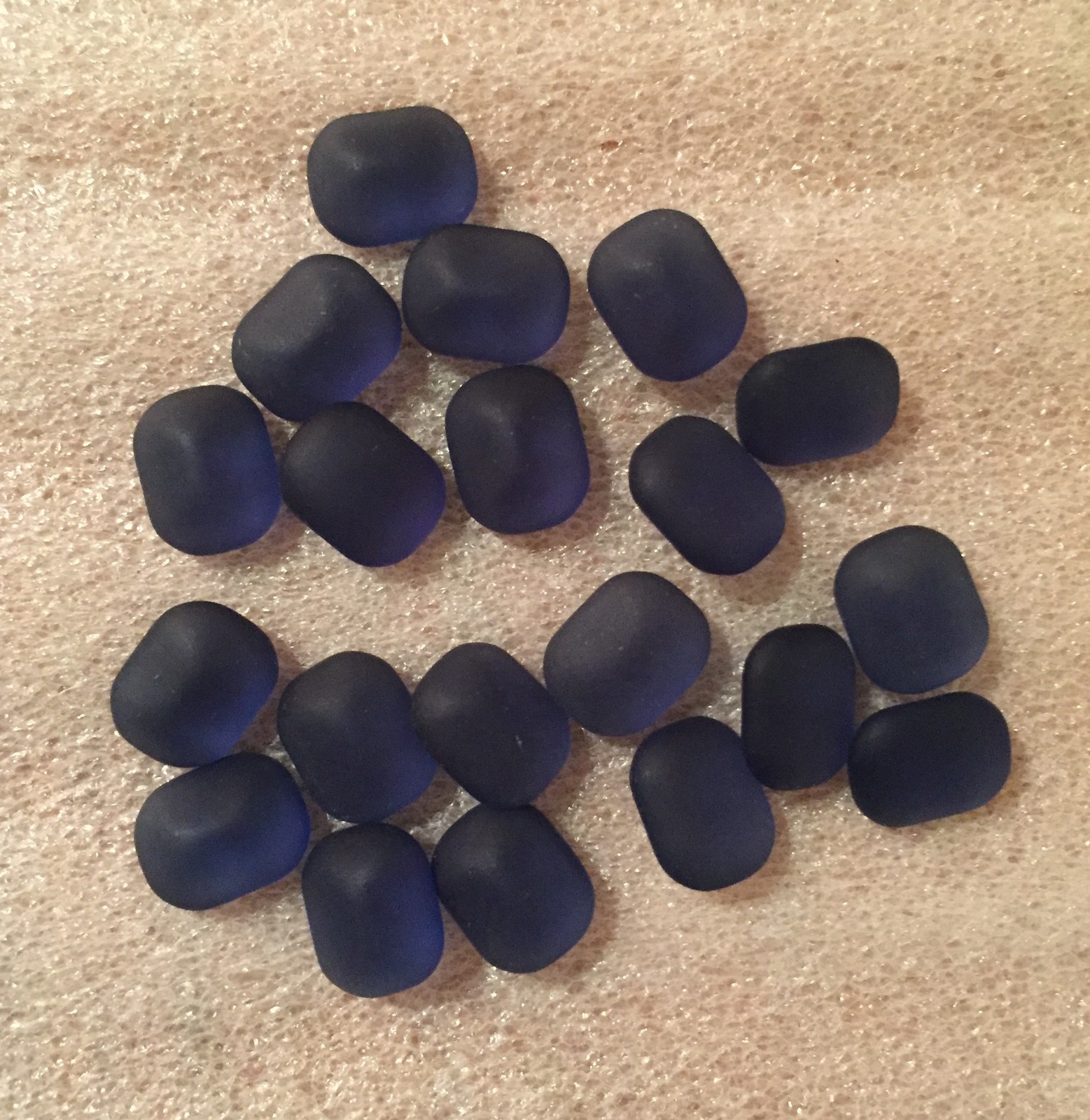 AM950 10x8mm navy blue matte glass octagons,smooth top,faceted back (24)