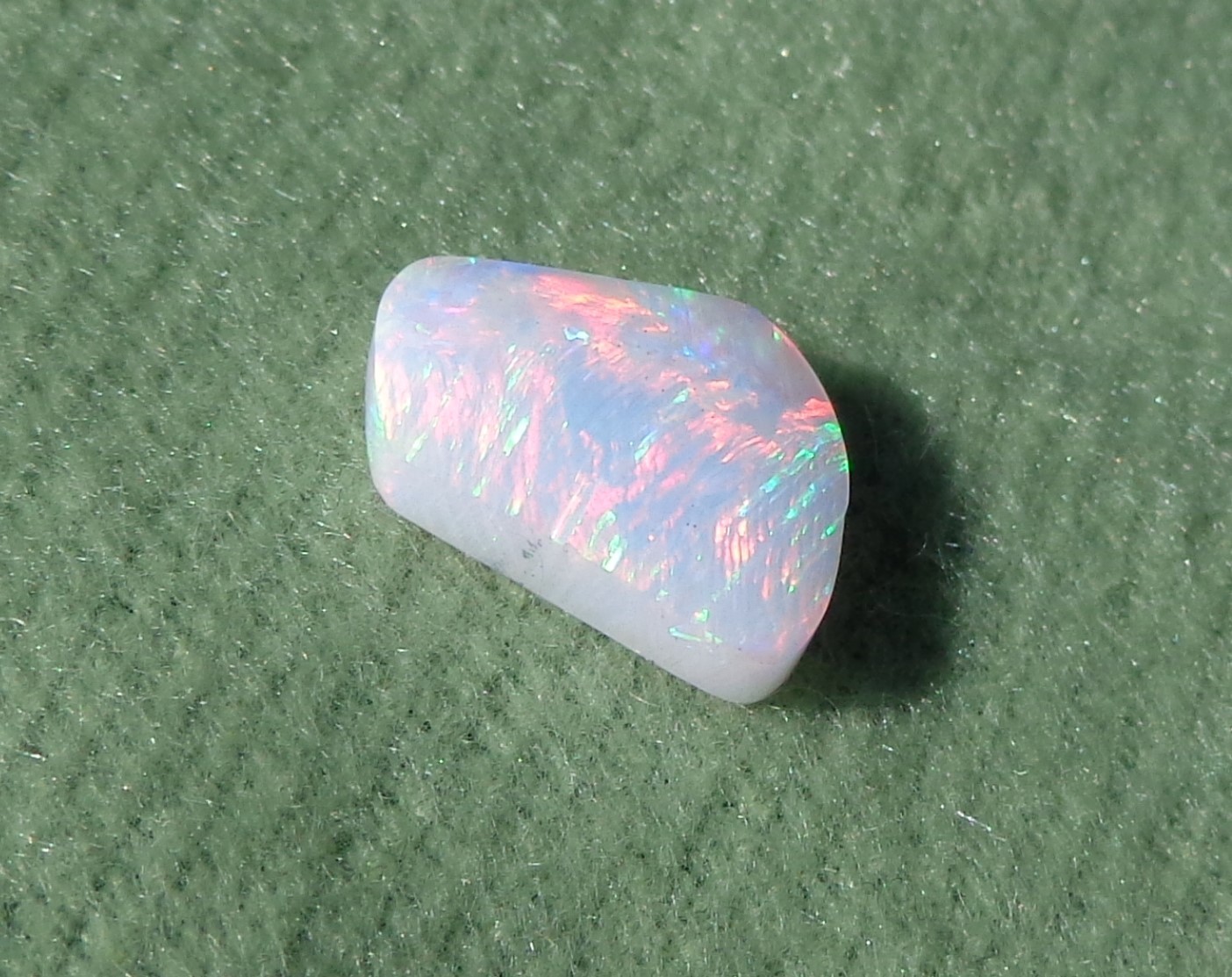 Spencer Idaho Opal Solid 9X15 mm with Unique Pattern and Red, Green, & Gold Fire
