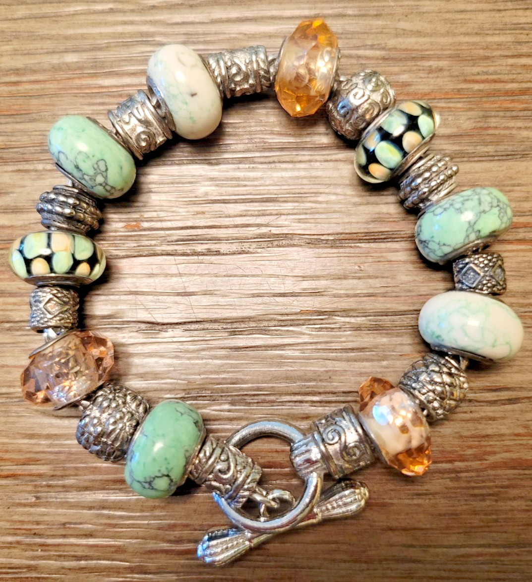 Beautiful Silver Toned Bracelet With (9) .925 Sterling Silver Beads.