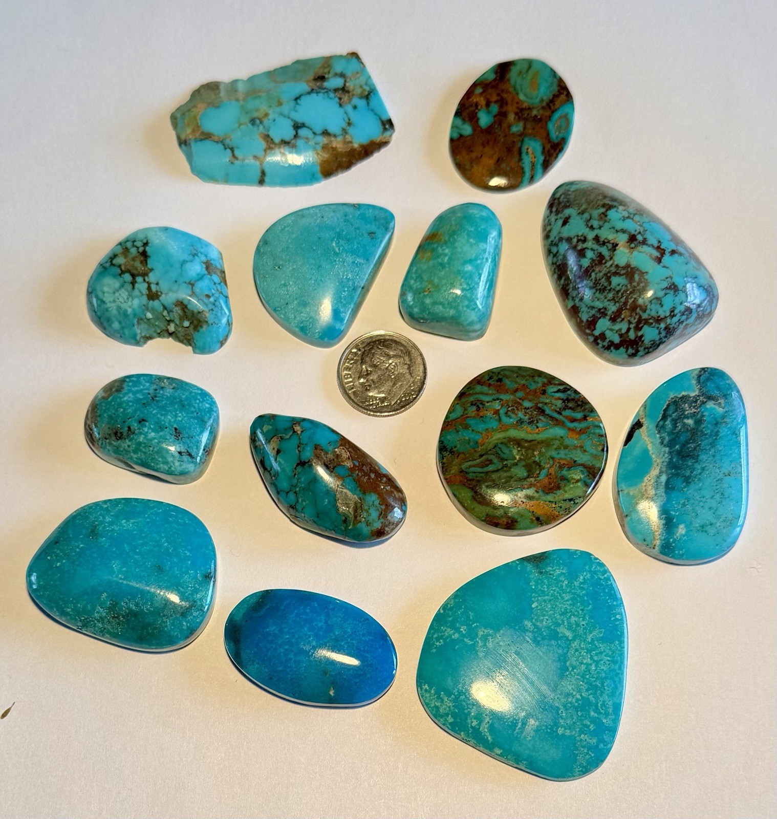Lot of 13 Turquoise Cabochons, Kingman, Royston, 132 Grams, 660 Carats.
