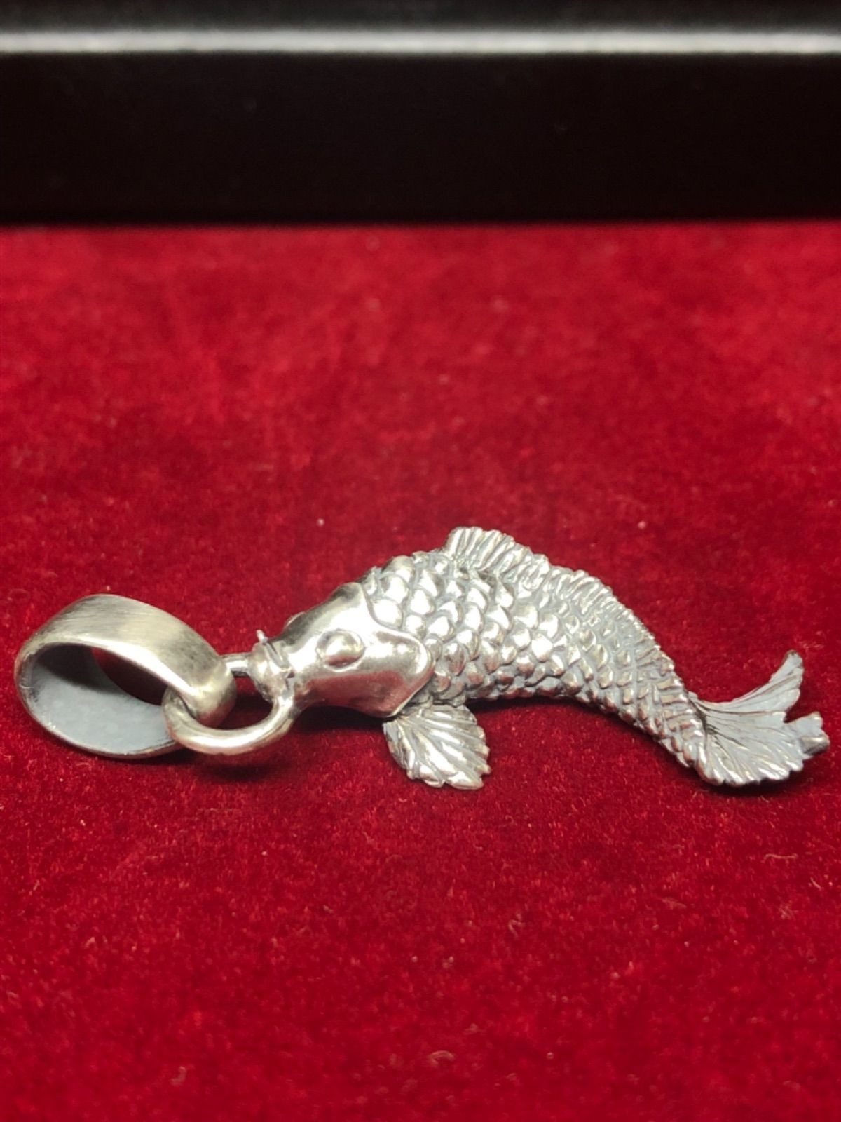 Ascending koi pendant top