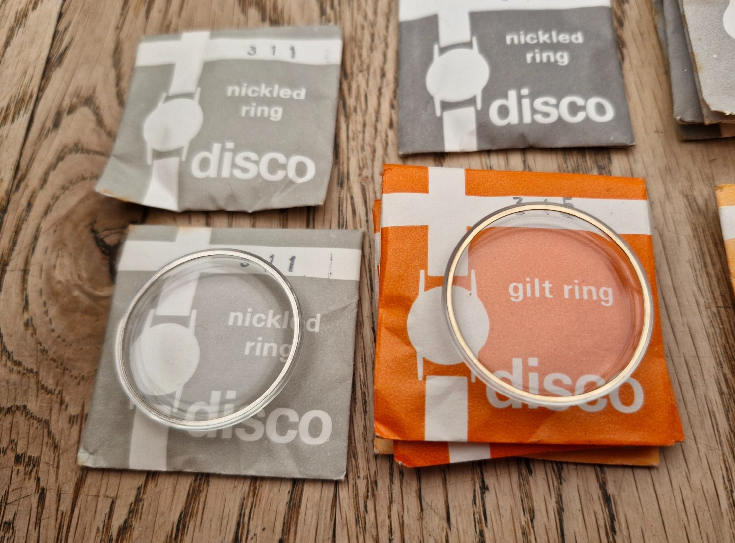 27 x Disco Watch Crystals Inc White & Gilt Metal Rings – Range 191 – 316 – N.O.S