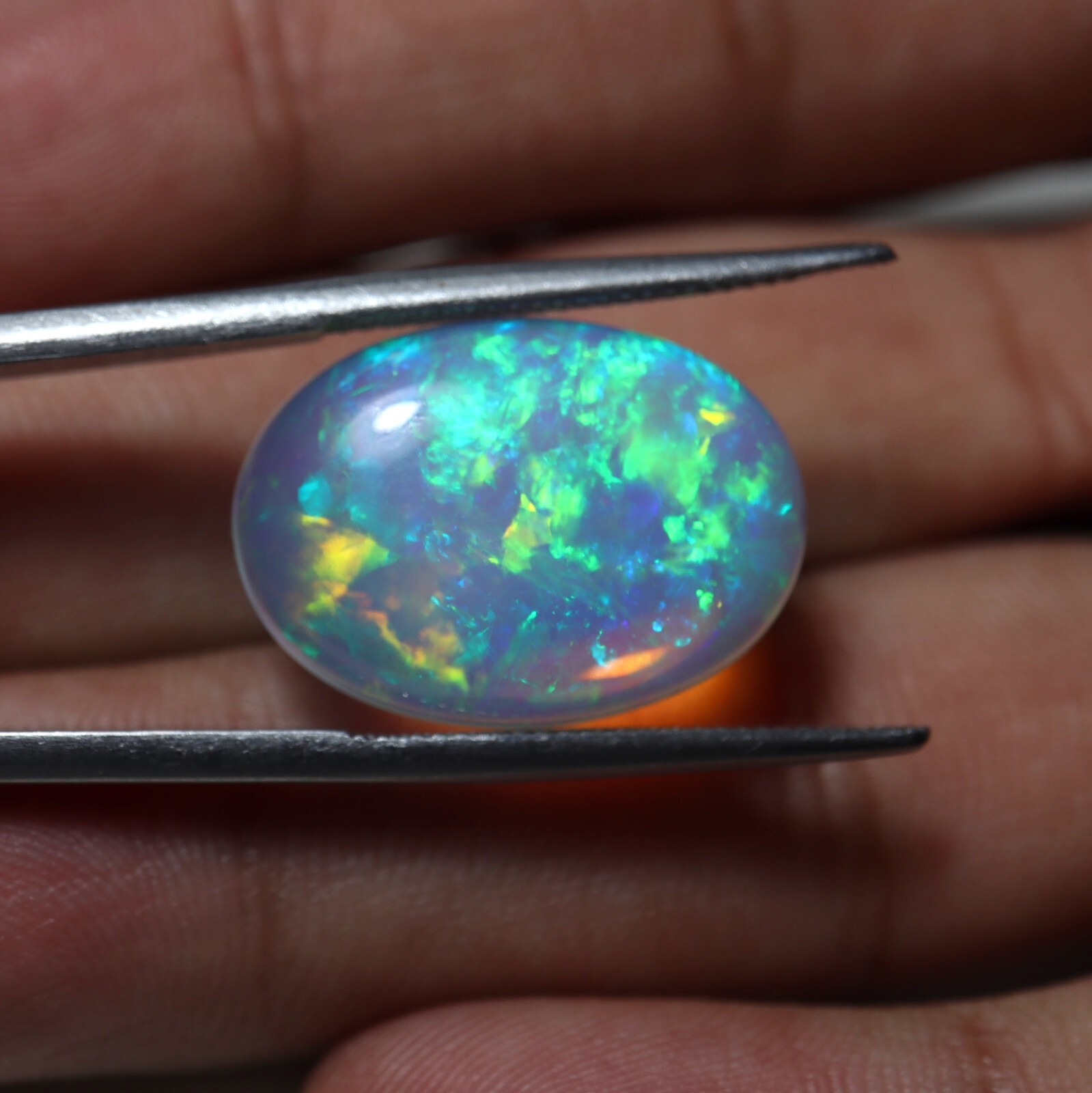 12.1 Ct 21.3×15.4 MM Natural AAA+ Multi Flashy Fire Ethiopian Opal Oval Cabochon