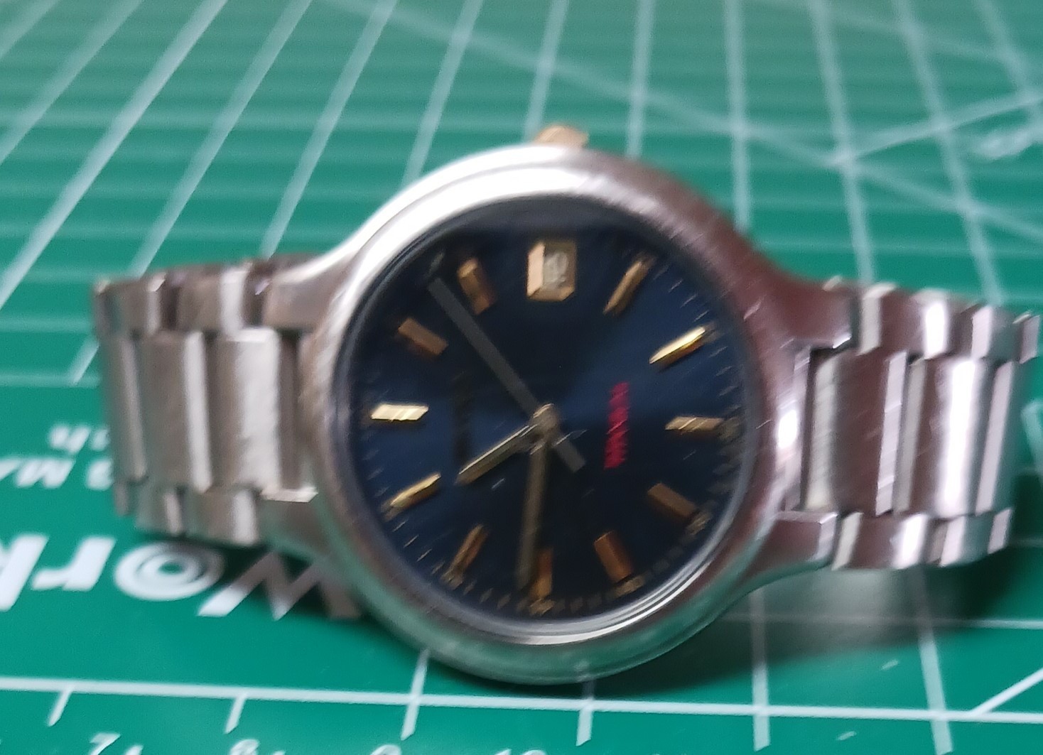 vintage Seiko Titanium quartz watch blue dial with gold hands & markers