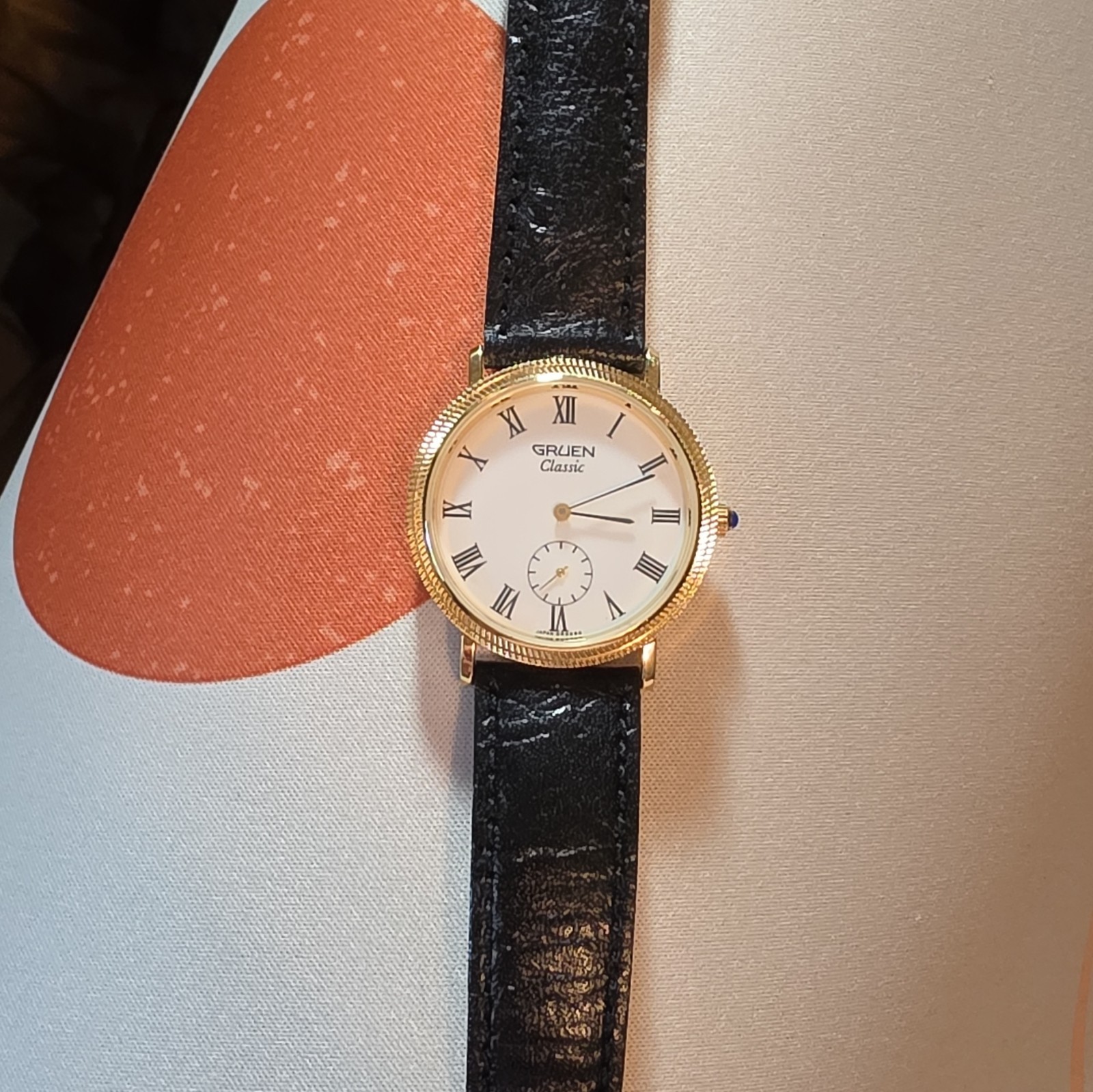 Gruen Classic Quartz Gold Tone Stainless Case White Roman Dial Black Leather