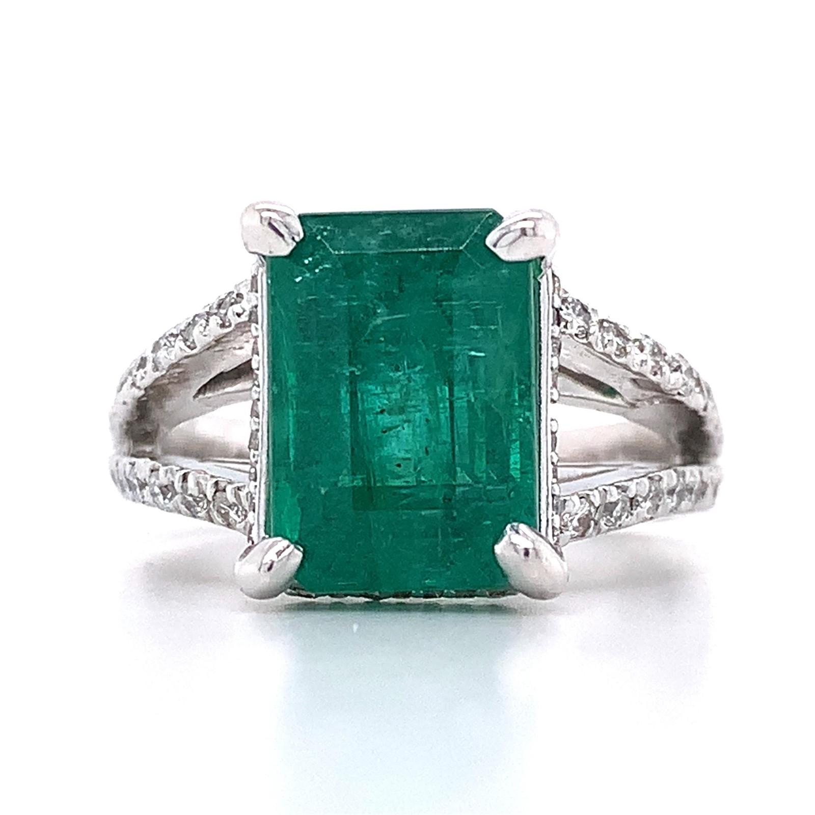 14K White Gold Emerald and Round Diamond Split Shank Open Cathedral Ring