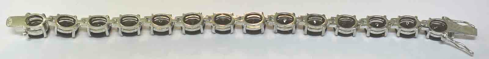 SILVER STERLING SMOKEY TOPAZ 42 CARAT BRACELET