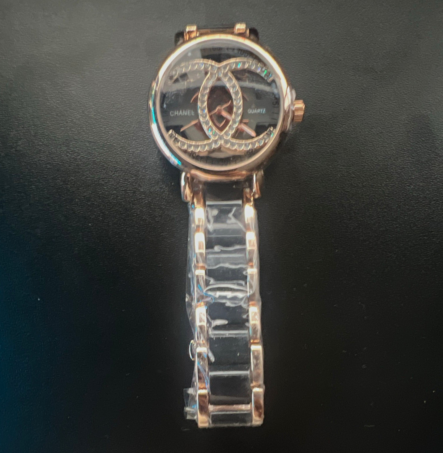 CHANEL Women’s Quartz Analog Watch Black Logo Dial Rose Gold Bracelet