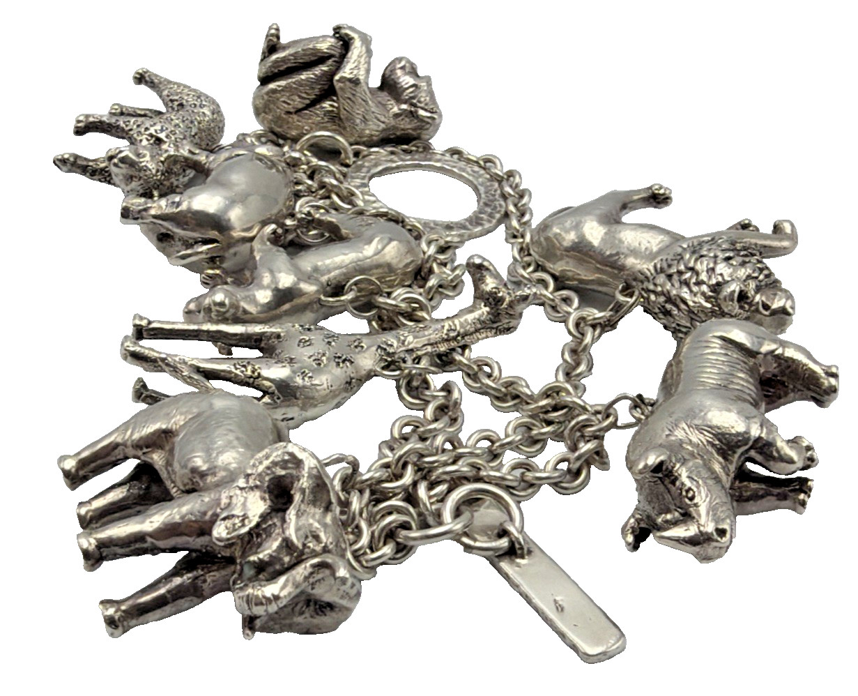VINTAGE SUSAN CUMMINGS STERLING SILVER ENDANGERED ANIMAL CHARM BRACELET HEAVY
