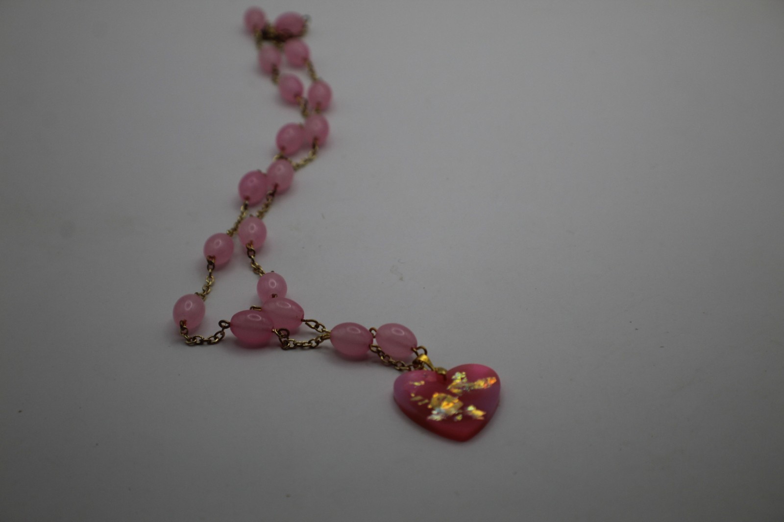 50 Shades Of Pink Heart Shaped Resin Pendant On A Beaded Chain