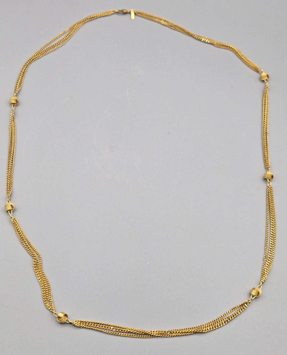 Vintage Monet Gold Tone Triple Chain Knotted Gold Tone Beads Station Necklace
