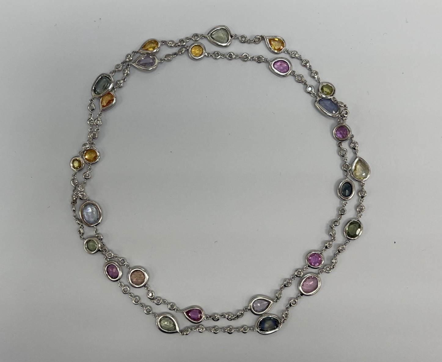 An Elegant White Gold Blue Sapphire and Diamond By-the-Yard Necklace