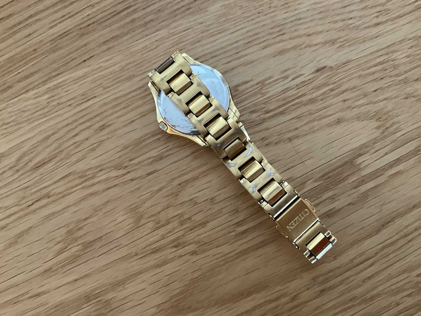 Citizen Eco-Drive EW1962-53A Women’s Silhouette Gold-Tone White Dial Watch