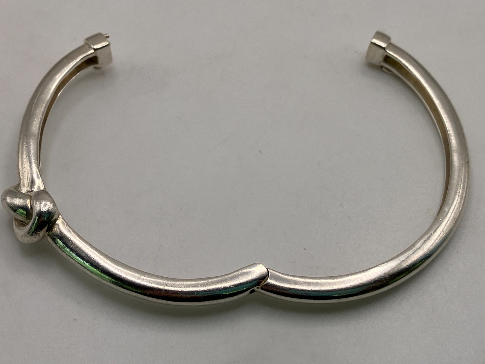 Sterling Silver Heavy Love Knot Hinged Bangle with Magnetic Closure Safety Latch
