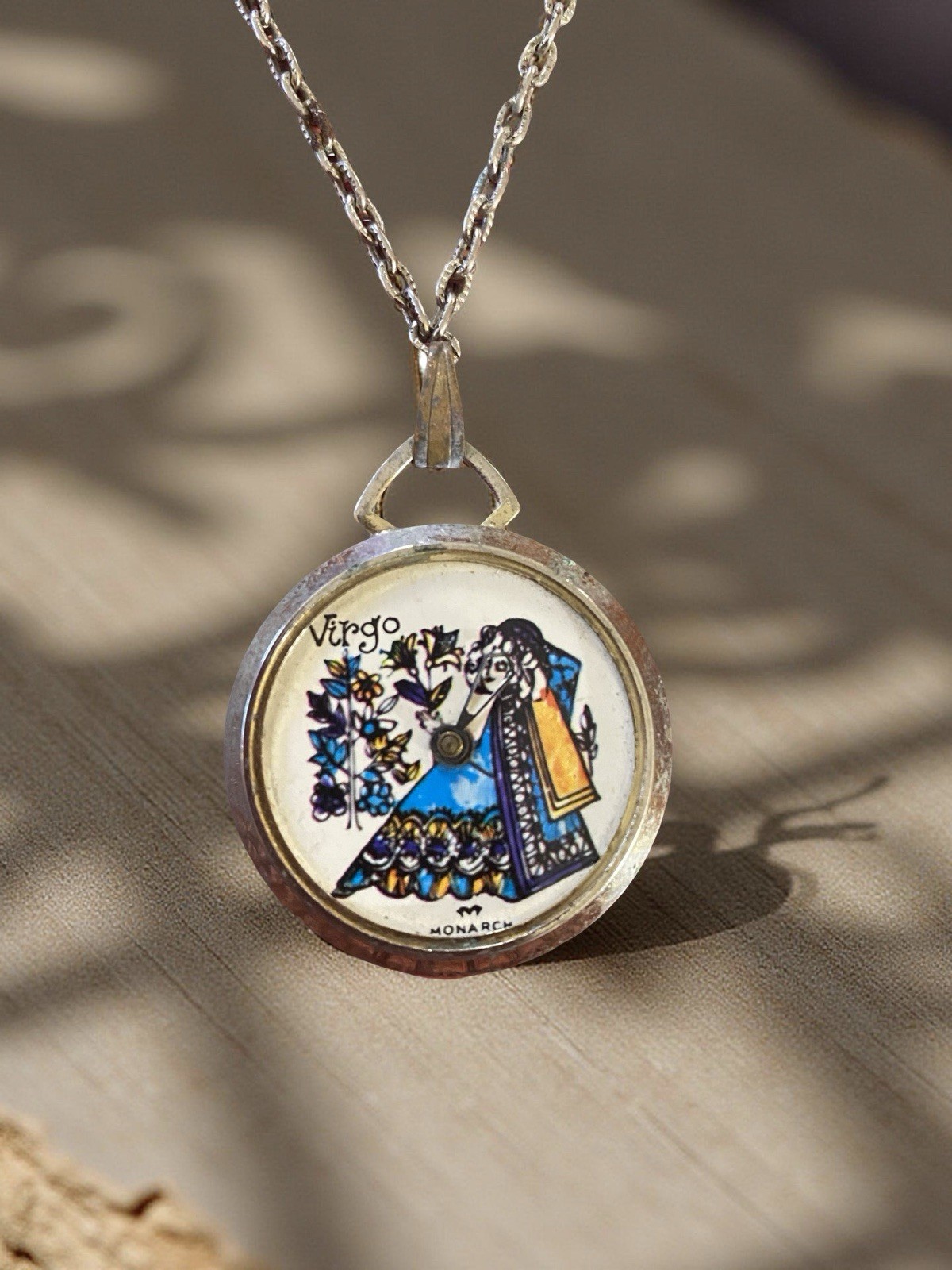 Brass pendant with Virgo zodiac sign illustration