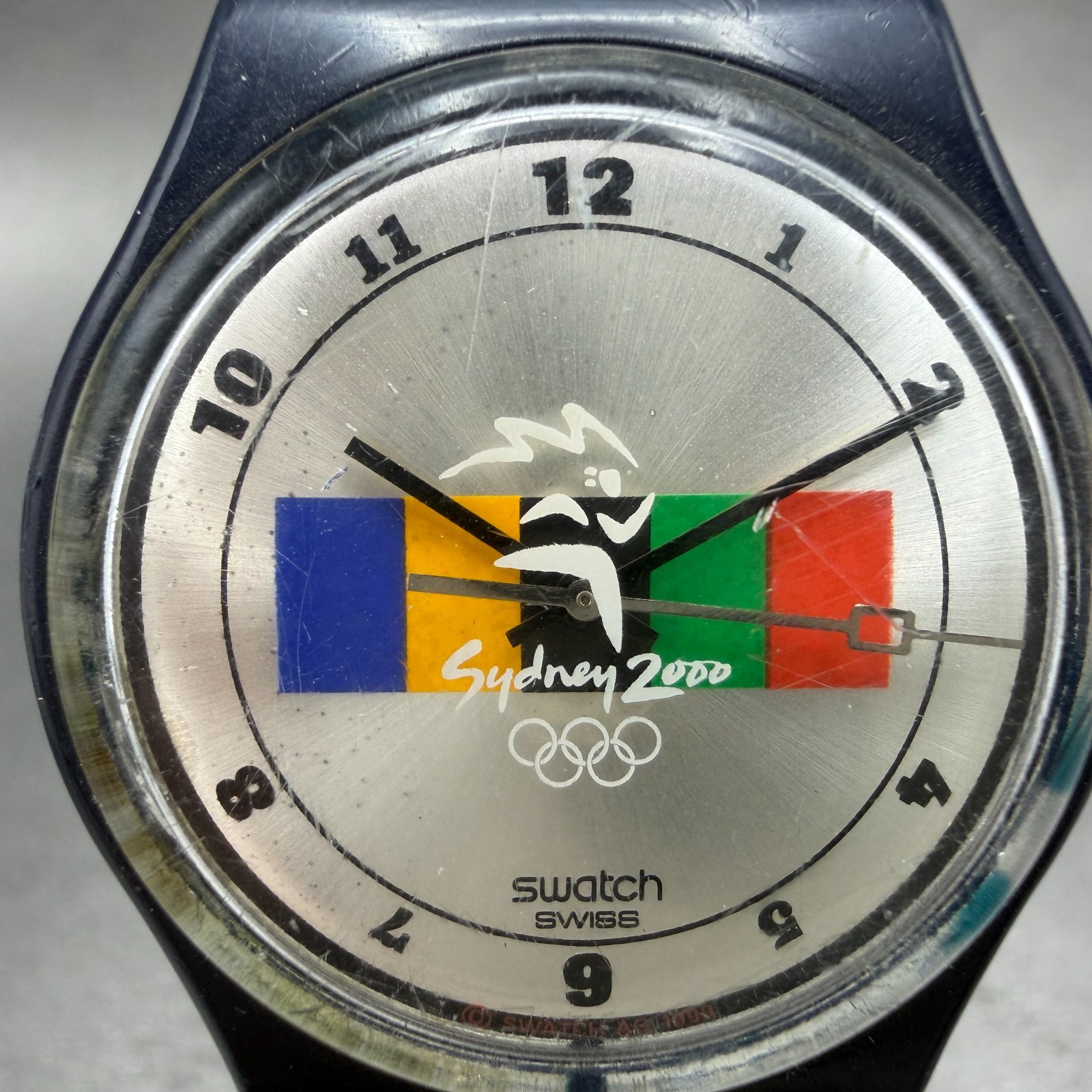 Swatch Olympics Sydney 2000 Watch Mne Silver Dial Blue Tone Round New Battery