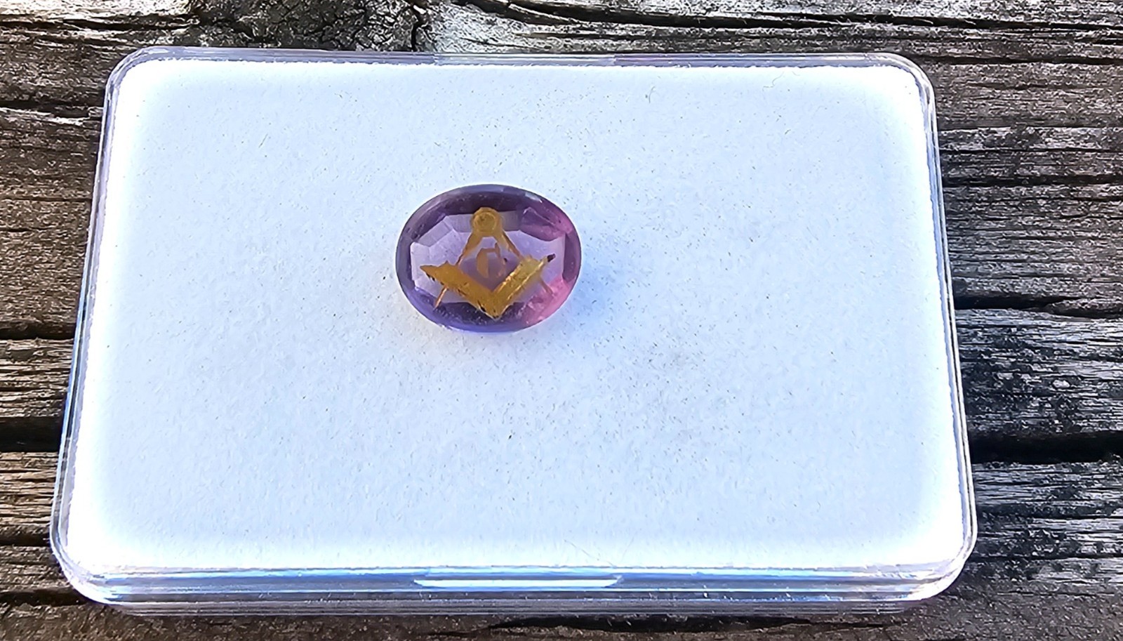 Amethyst 11.4×9.5mm Oval Loose Stone with Mason symbol