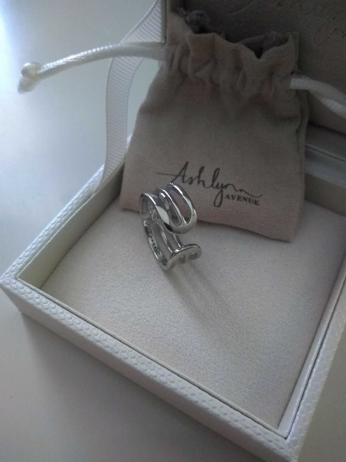 Ashlynn Avenue Aurora White Gold Trio Wrap Ring with Center Stone Size 6