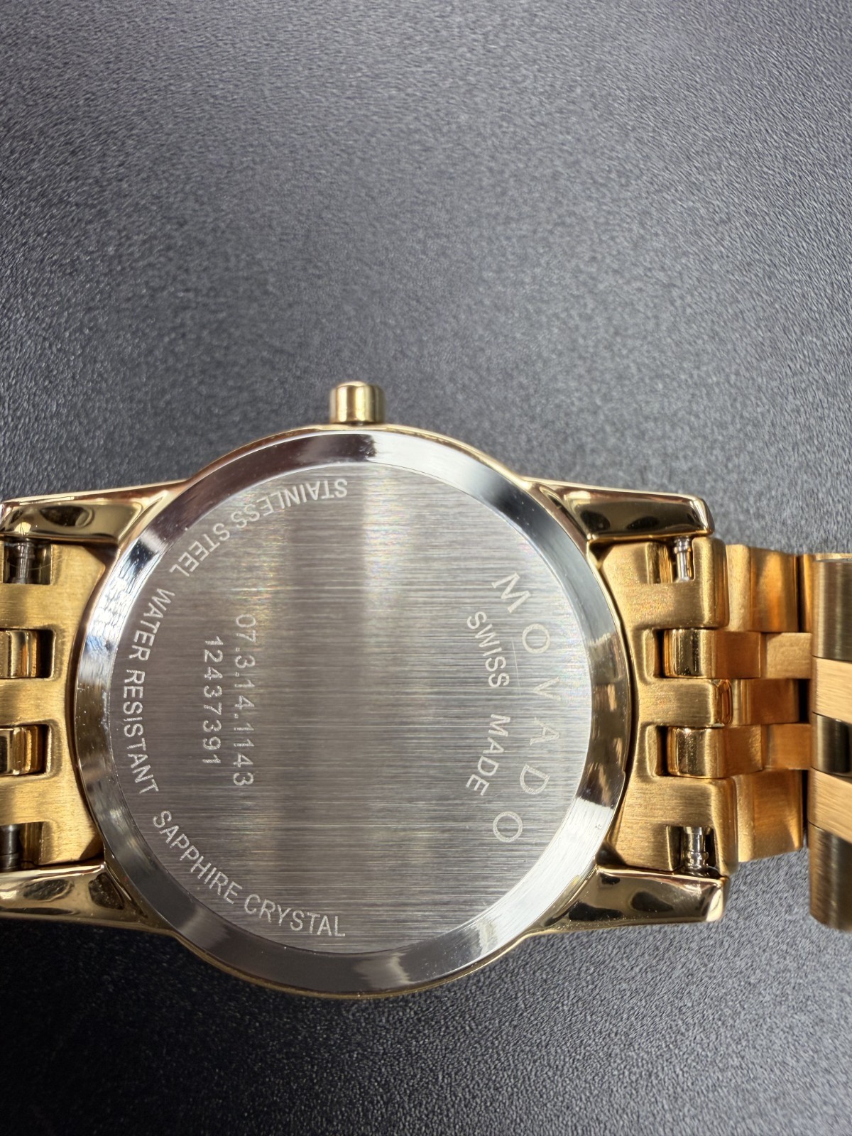 NEW MOVADO MUSEUM WOMEN’S GOLD TONE BLACK DIAL 28MM WATCH 0607005