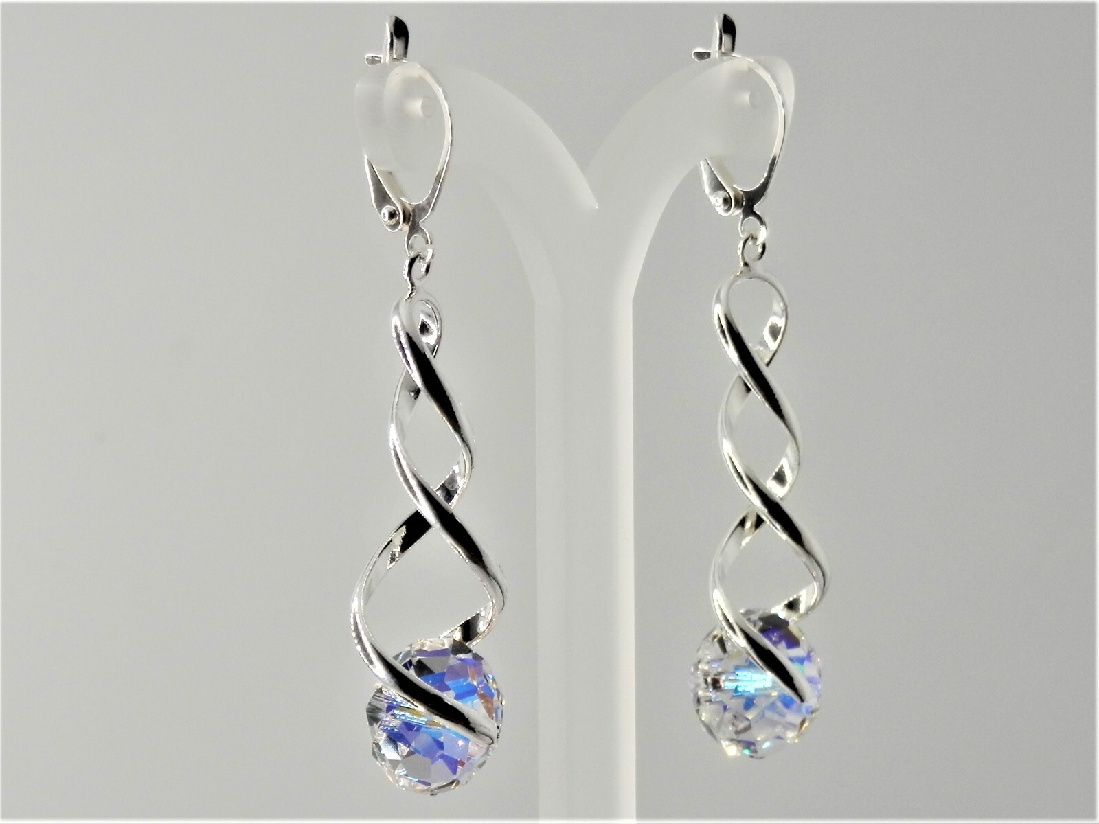 Austrian Crystal, clear with AB, spiral silver plated, clip-on, lever back