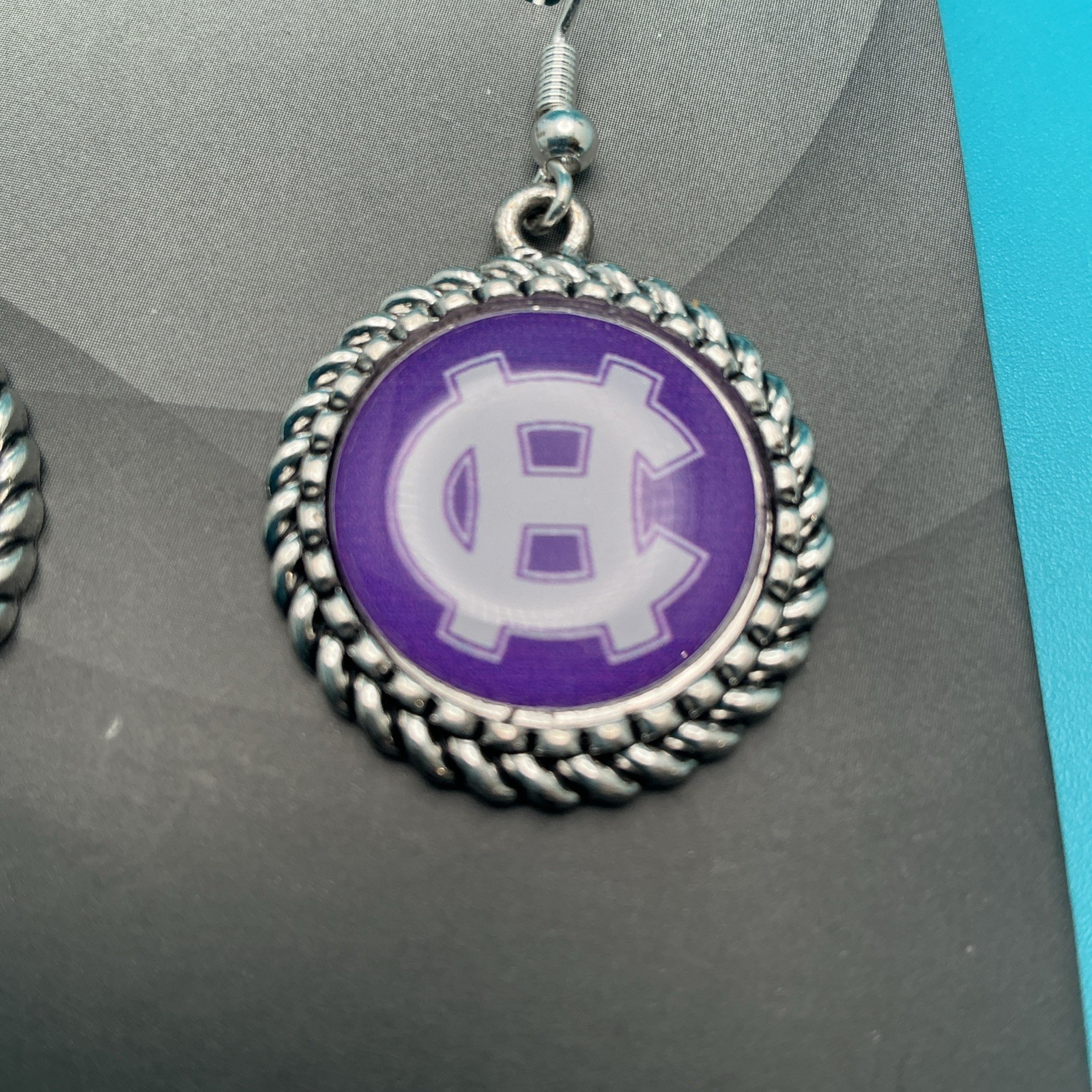 Holy Cross College, Cabochon-Style Medallion Nina Earrings Braided Silver Tone