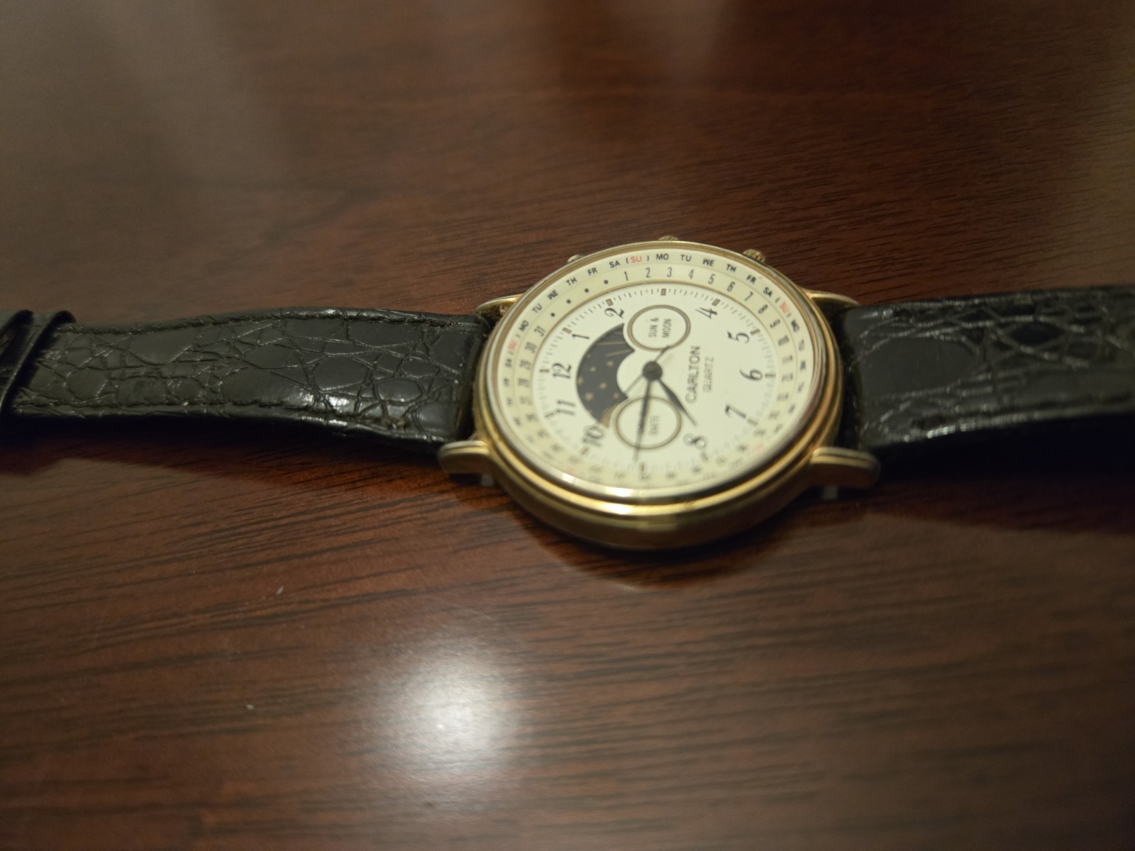 Carlton Quartz Moon & Sun Phase Date Gold Watch White Dial Black Leather Strap