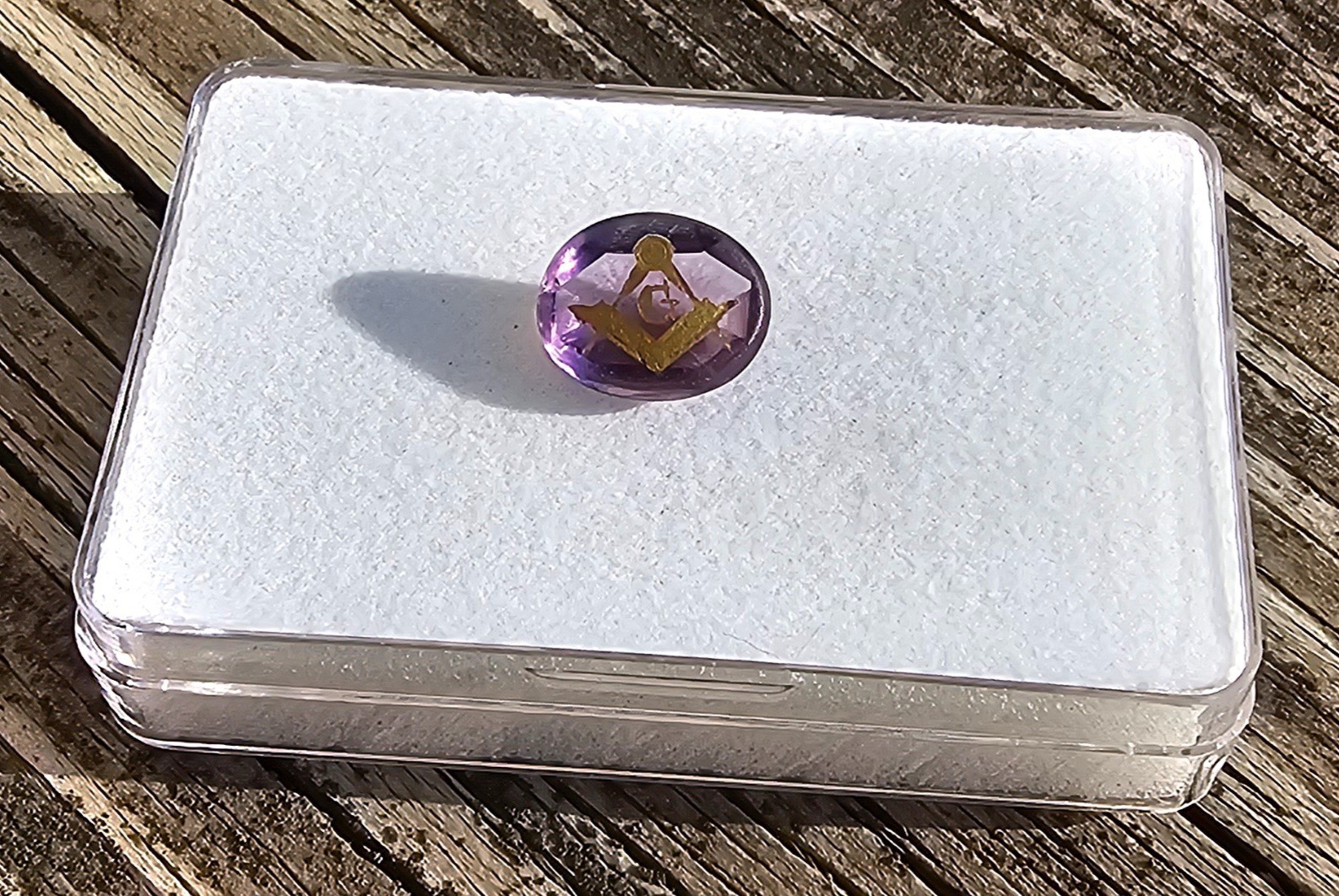 Amethyst 11.4×9.5mm Oval Loose Stone with Mason symbol