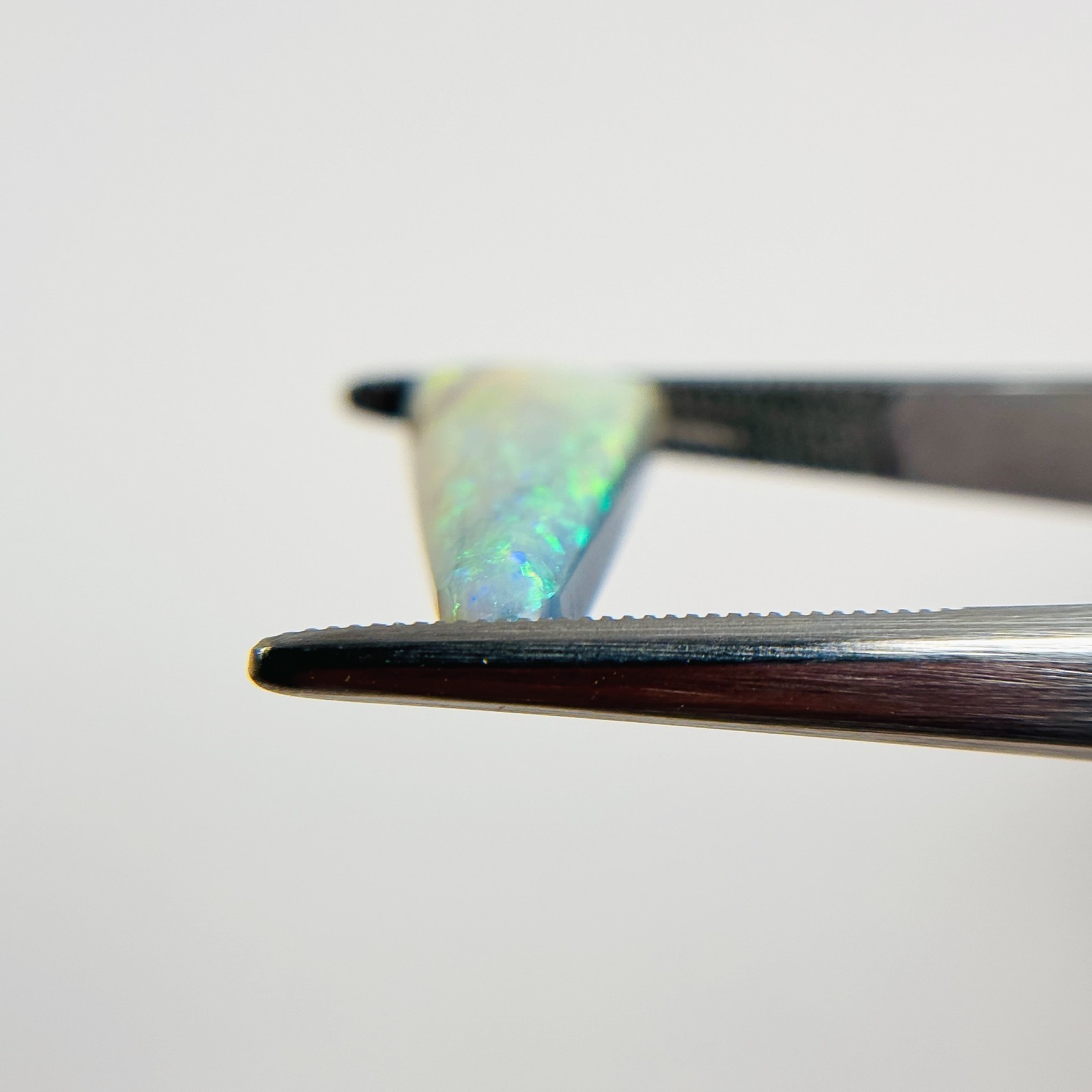 Semi Black Opal Multicolour 18×8.5×4.1 Cabochon Triangle 3.85 Carat OPAL138