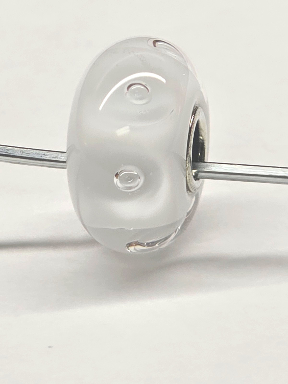 White Bubbles Glass Trollbeads TGLBE-10231. By Lise Aagaard. Retired In 2021.