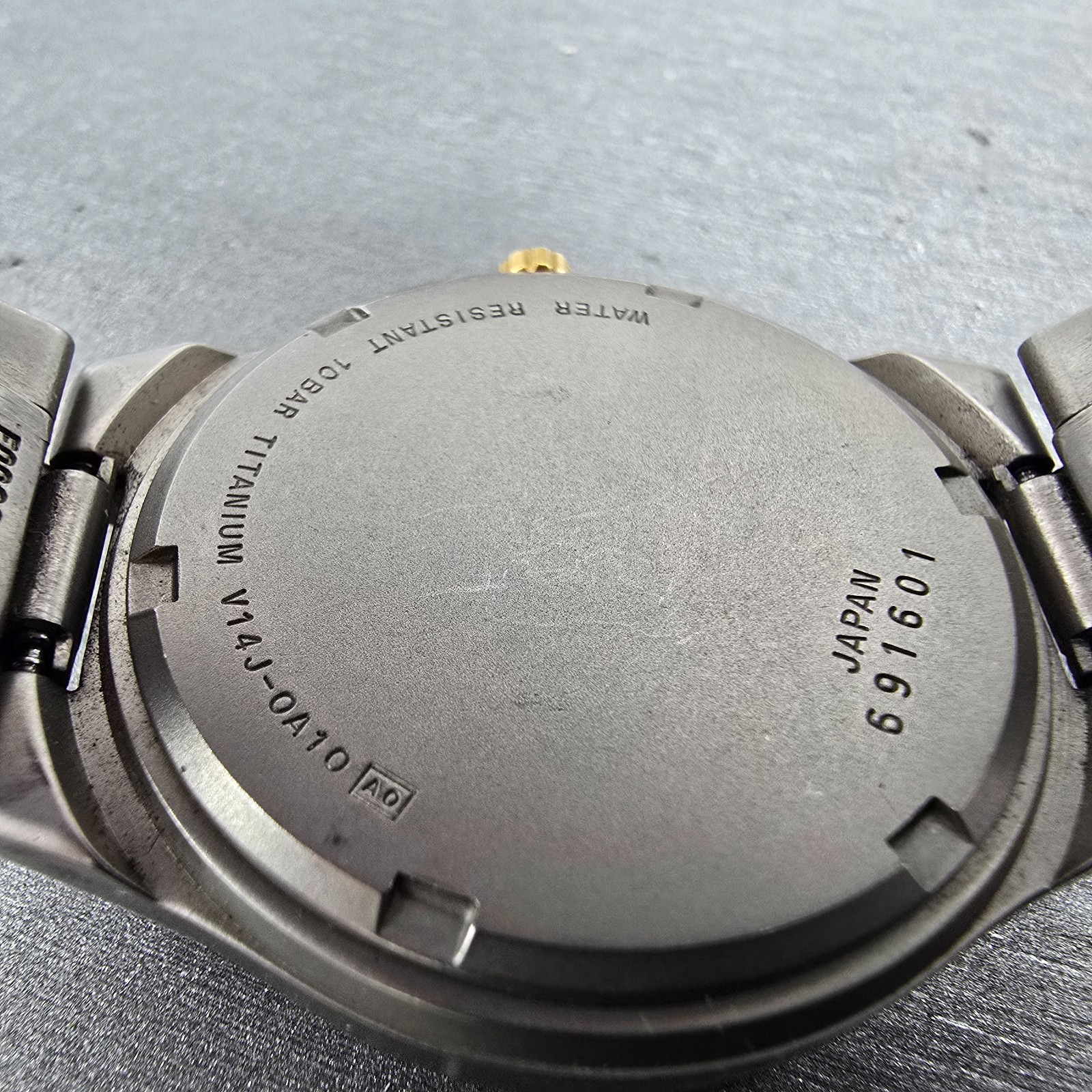 Seiko Alba Epsilon Watch Men 36mm Gray Dial Titanium Daydate V14J-0A10 Runs