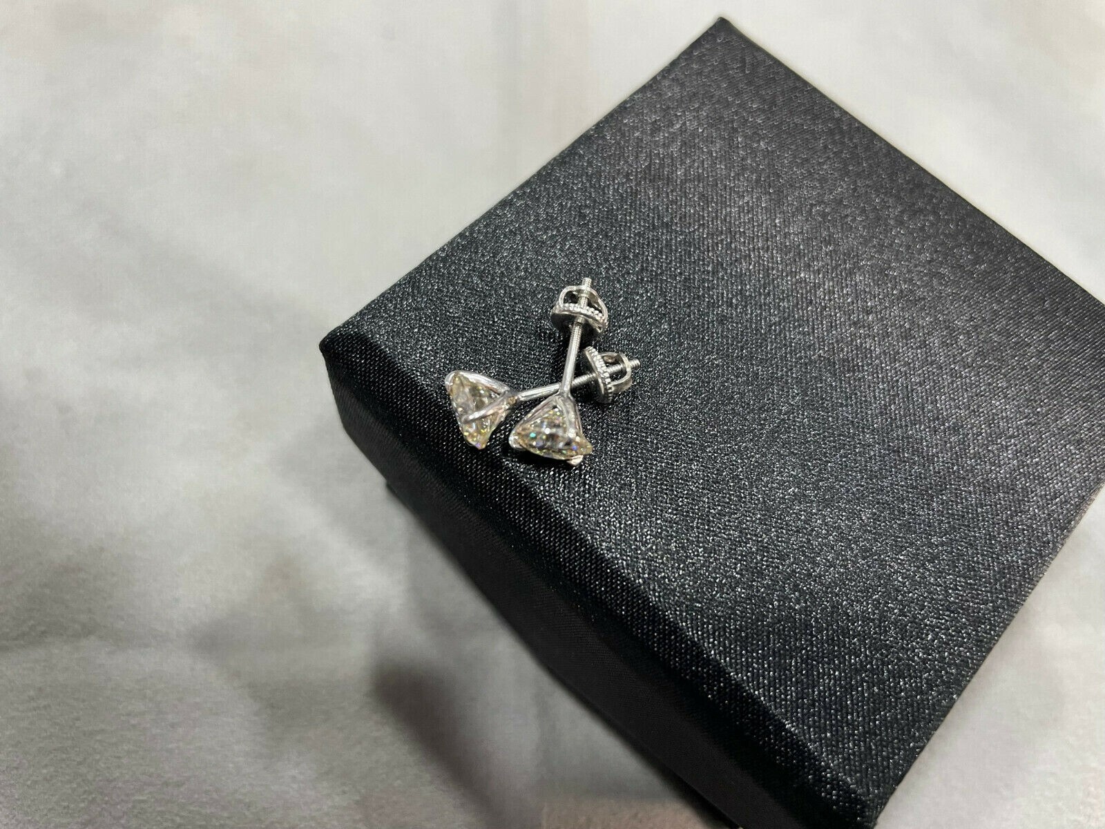 0.10 Ct. Off White Heated & Pressure Treated Diamond 3 Prong Studs in 925 Silver