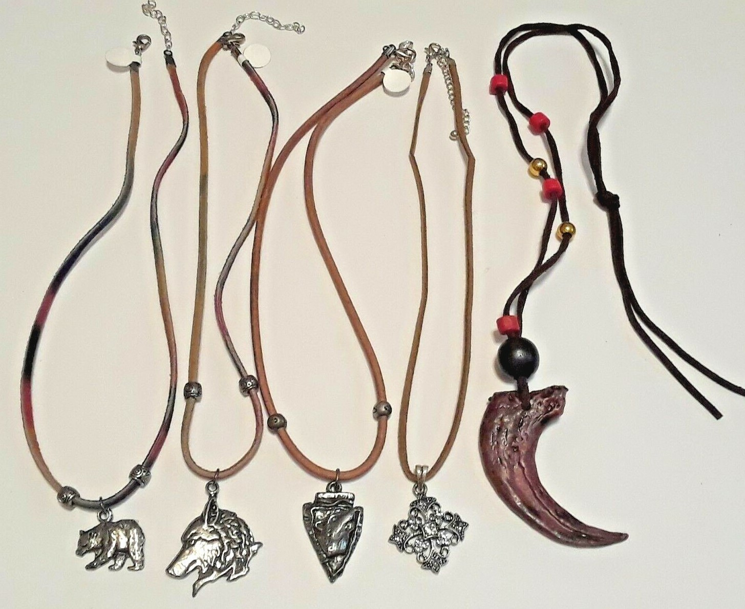 Animal shape pendants silver tone on leather rope chains 18″ long. 5 necklaces
