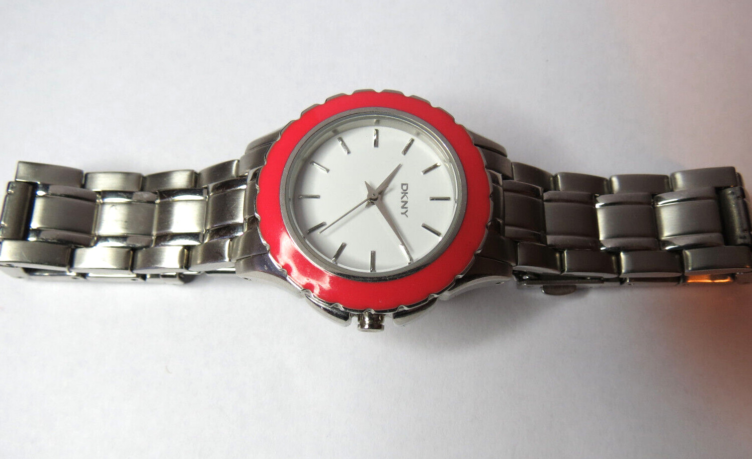NICE WOMENS DKNY QUARTZ SPORT 5 ATM PINK BEZEL WATCH FRESH BATTERY RUN’S,