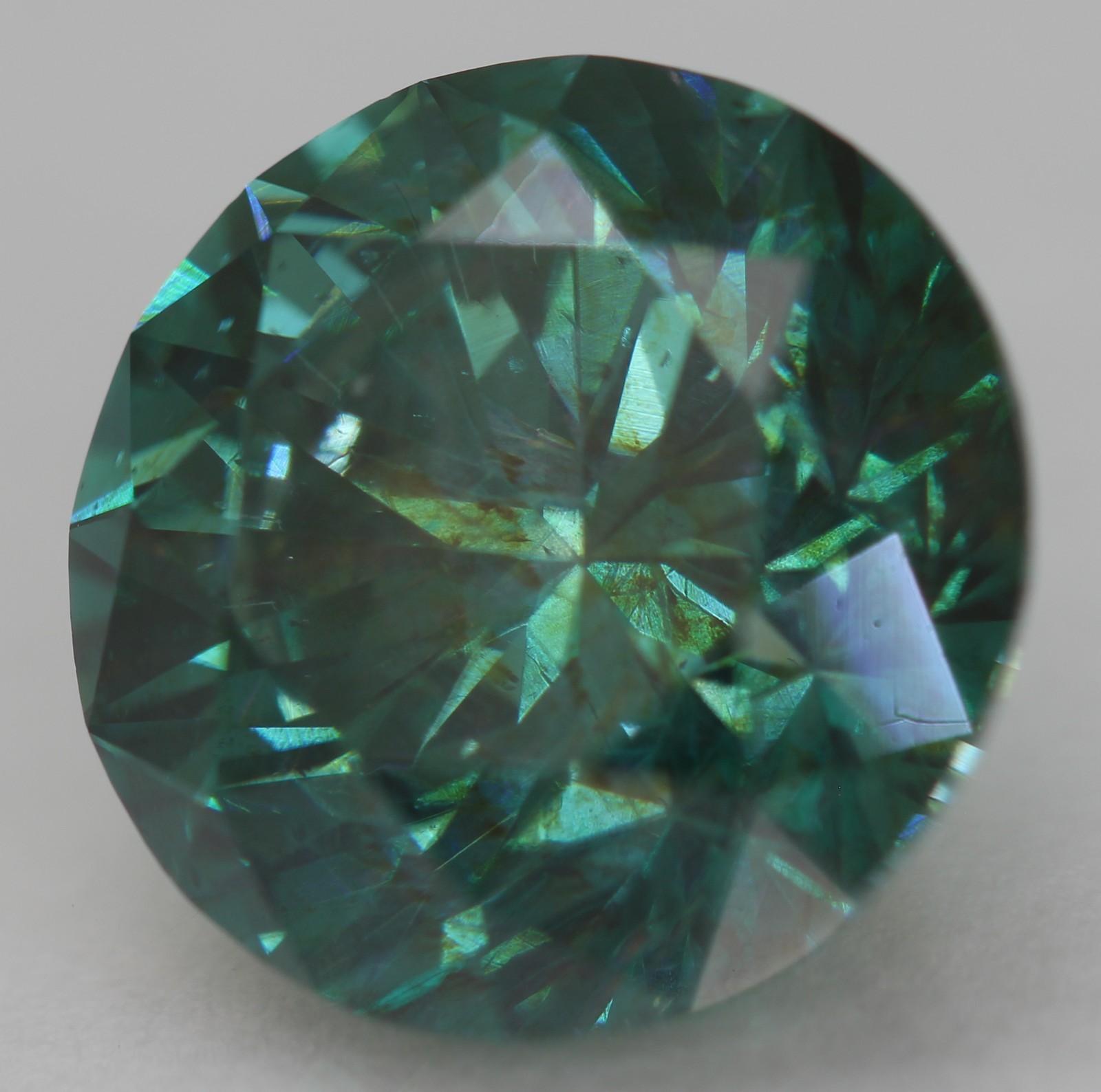 Cert 4.24 Carat Vivid Blue VVS2 Round Brilliant Natural Enhanced Diamond 10.2mm