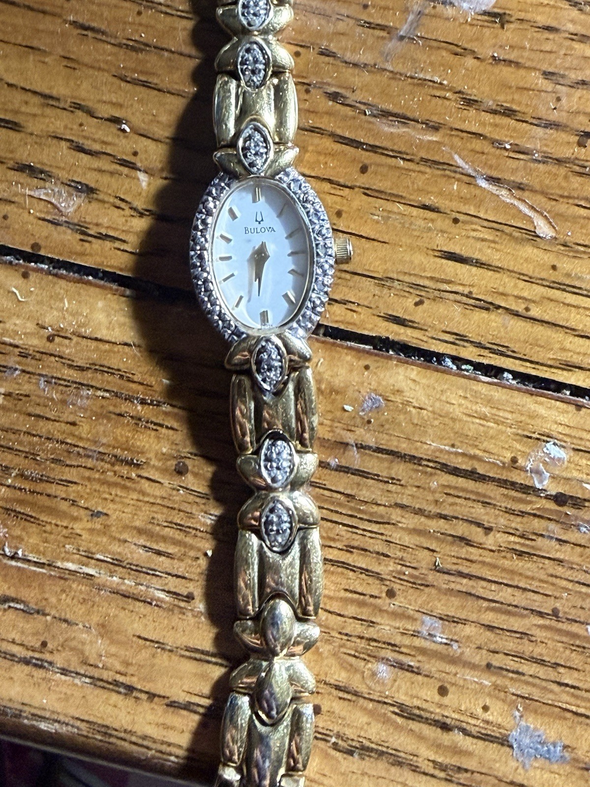 Bulova Women 98R34 Luxury Diamond Bezel Gold Tone Quartz Analog Watch