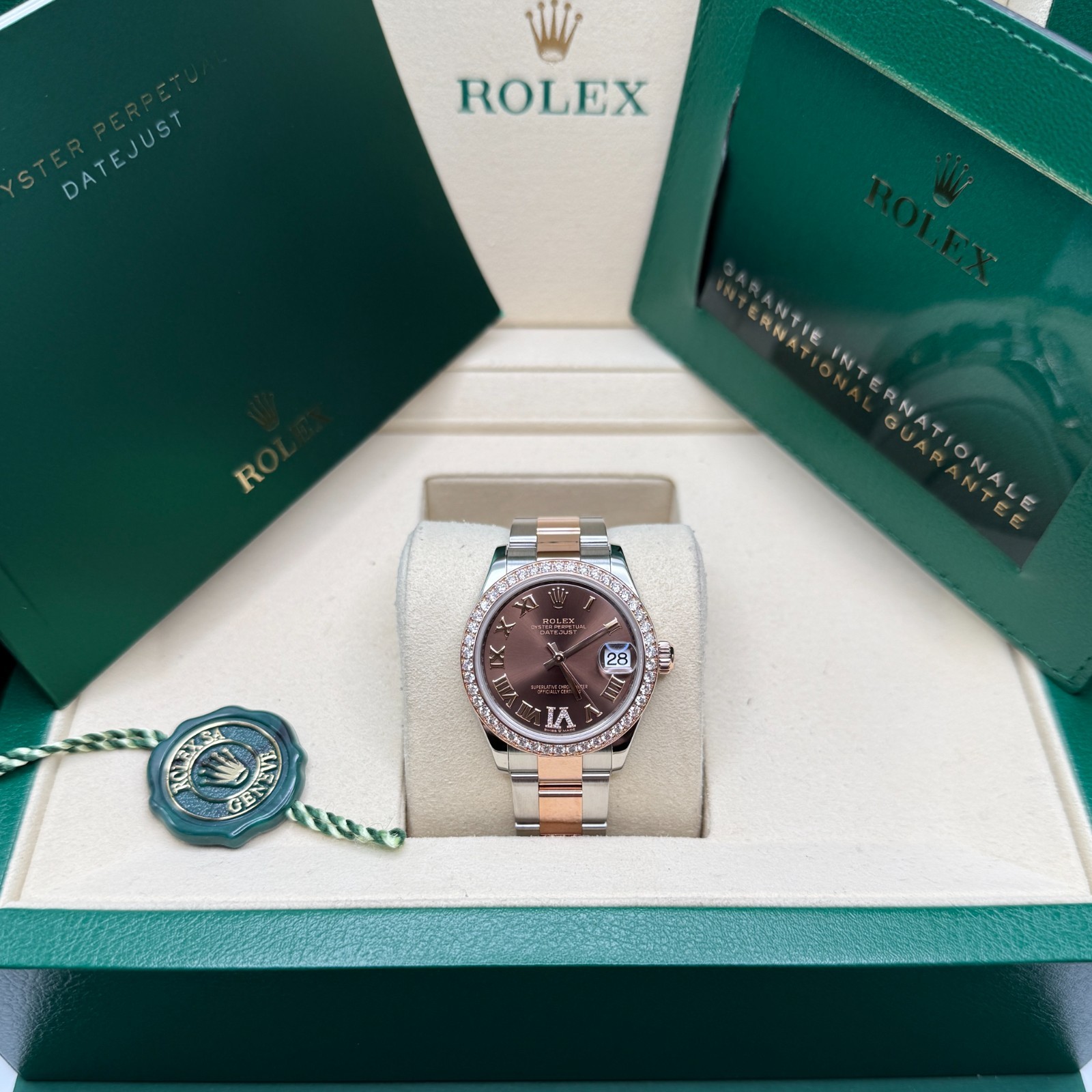 Rolex Datejust 31 NEW 2025 Chocolate Pave 6 Roman Diamond Bezel Two Tone Oyster