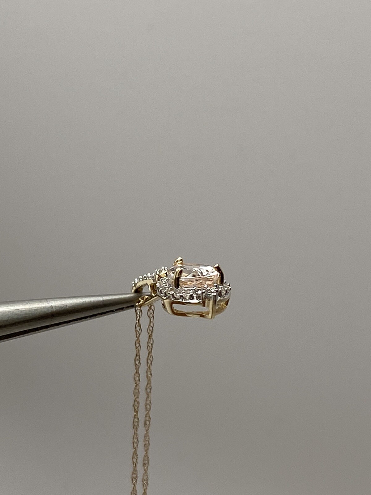 10K Yellow Gold Pear Shape Morganite and 0.11ct twt. Diamond Pendant with Chain