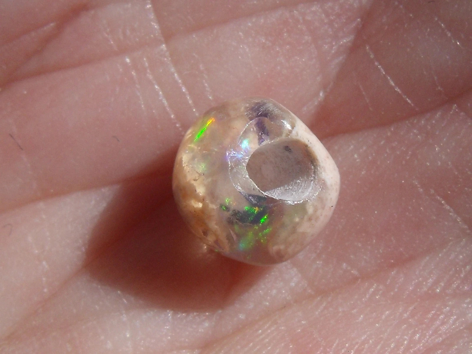 1.91 Ct. Round Cut Mexican Cantera fire opal bead.