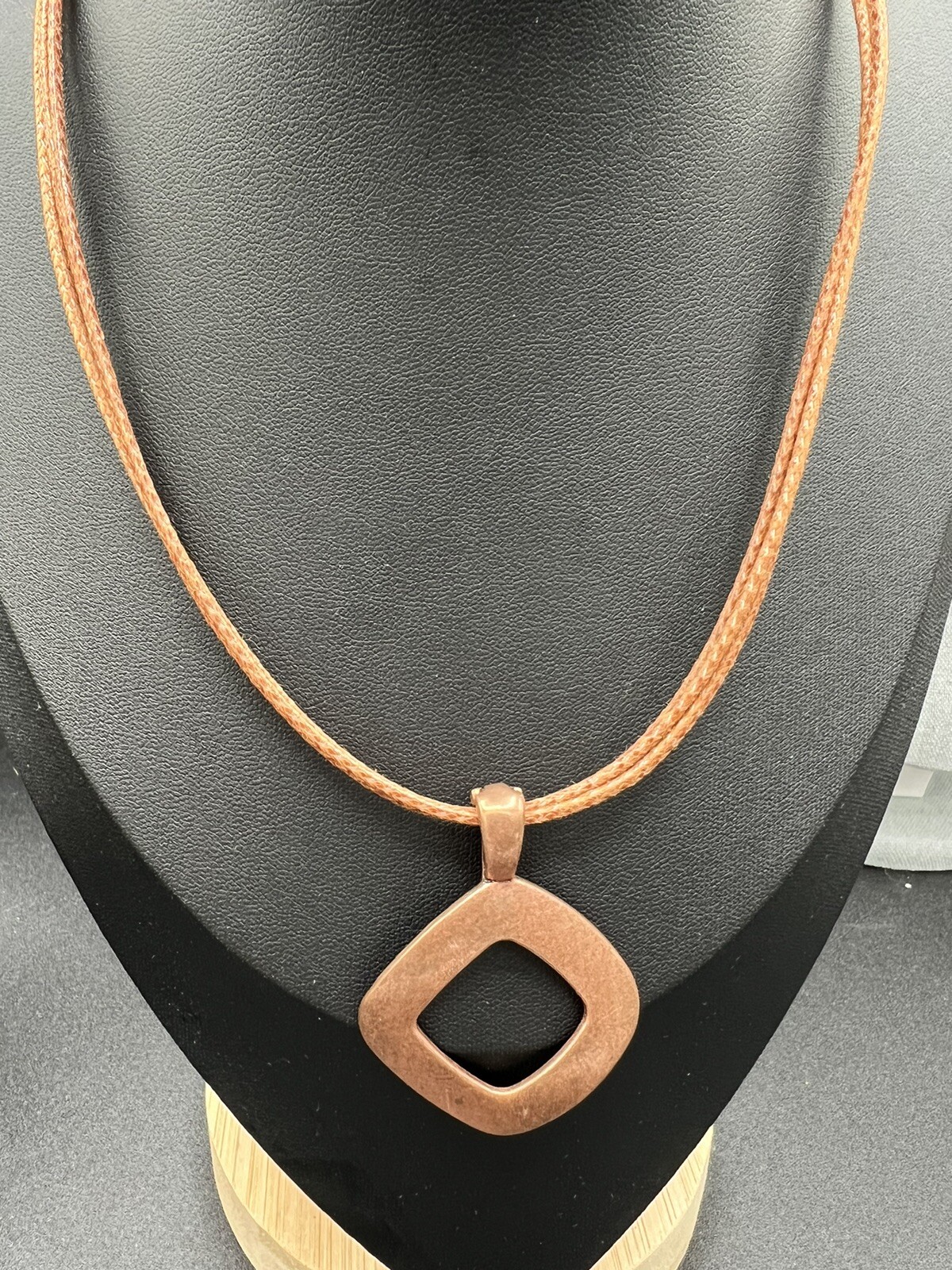 PREMIER DESIGN Embers modernist copper tone pendant on leather cord necklace 18”