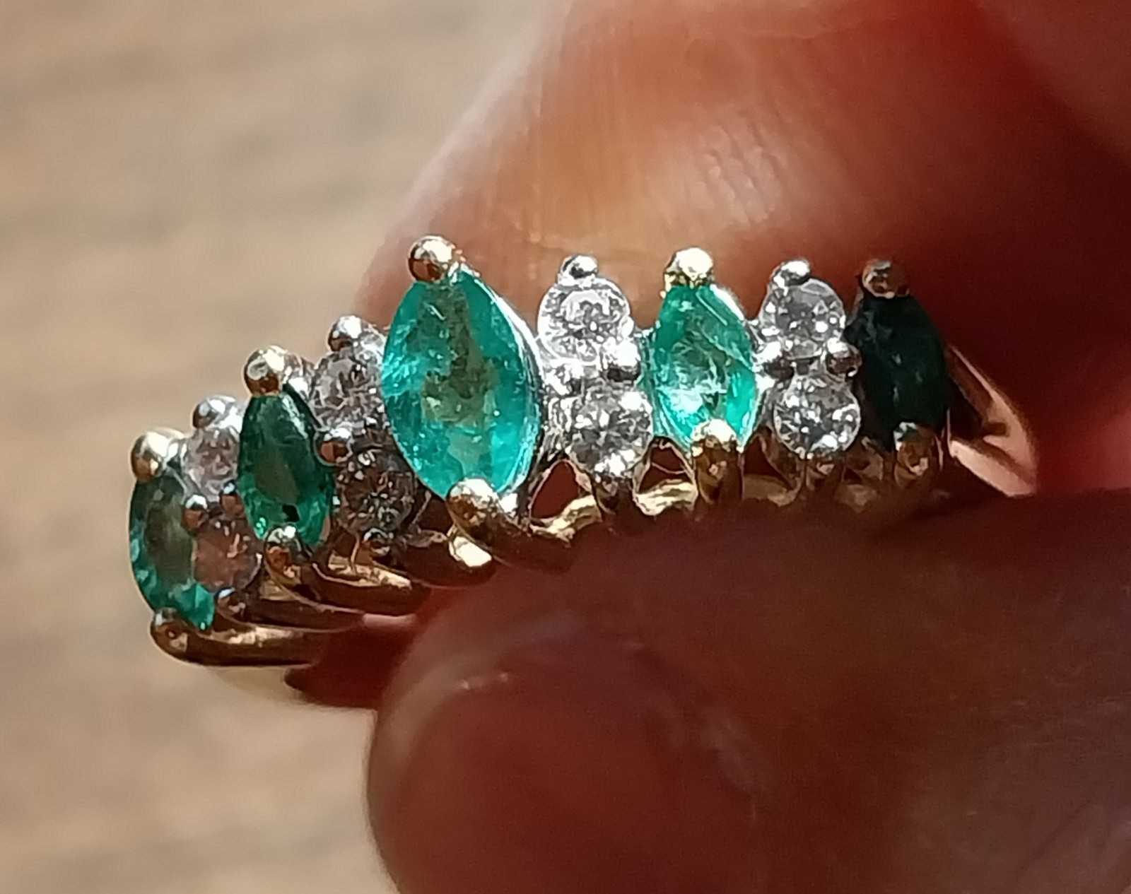 Ladies Marquise Emeralds with small Diamonds set in 14K (tested) gold ring