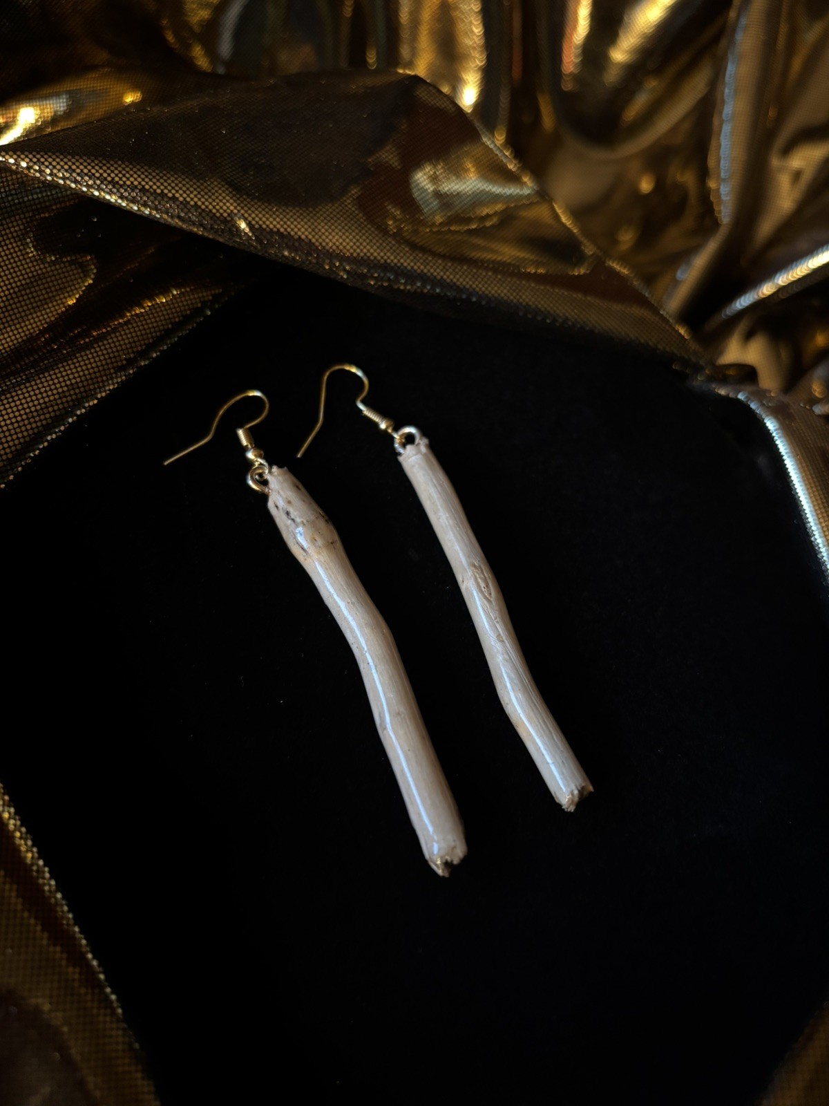 One of a kind jewelry made from real pieces of wood coated in resin
