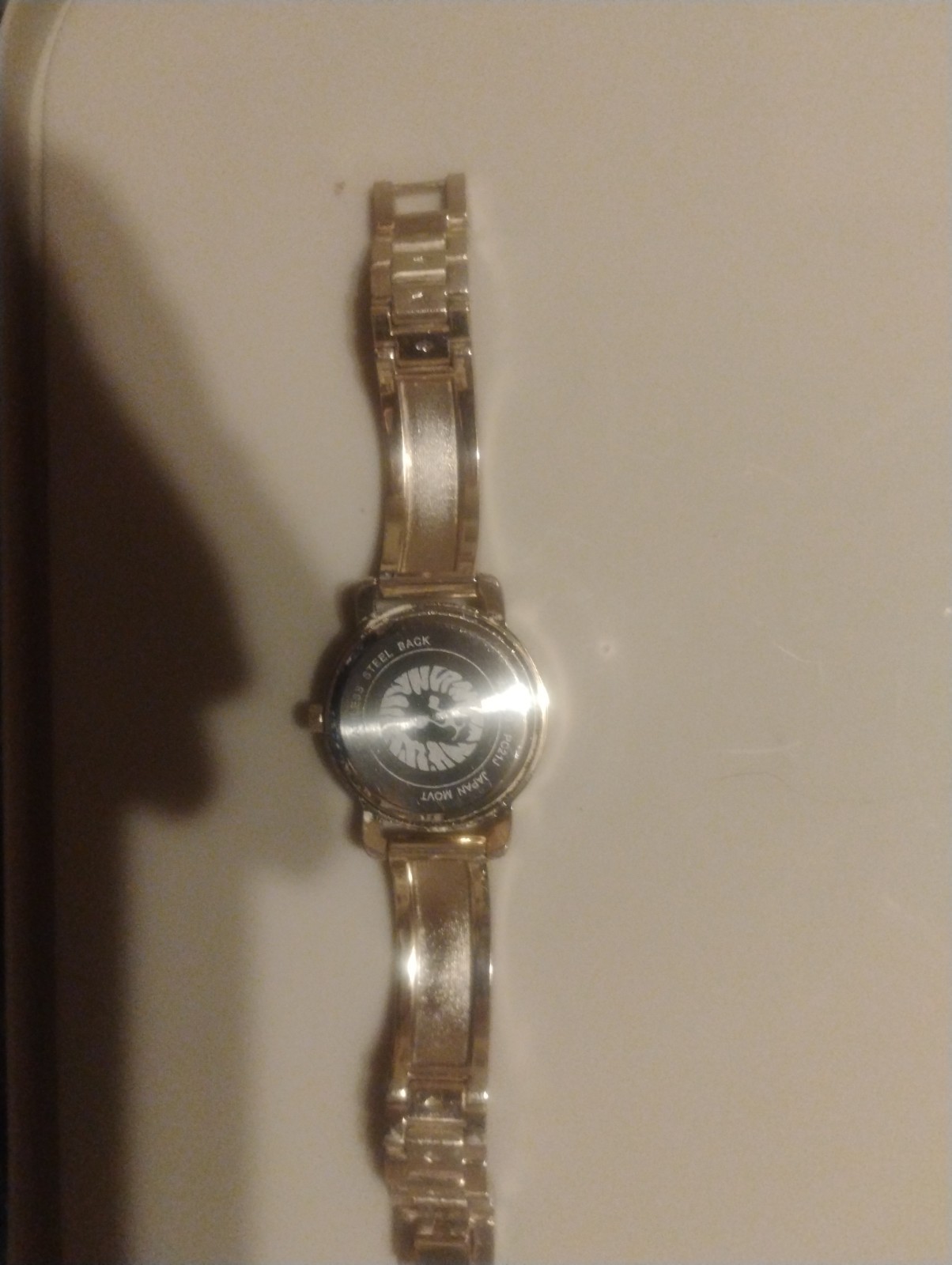 Anne Klein Women’s Glitter Accented Bangle Watch, AK/3690, Gold/White Details