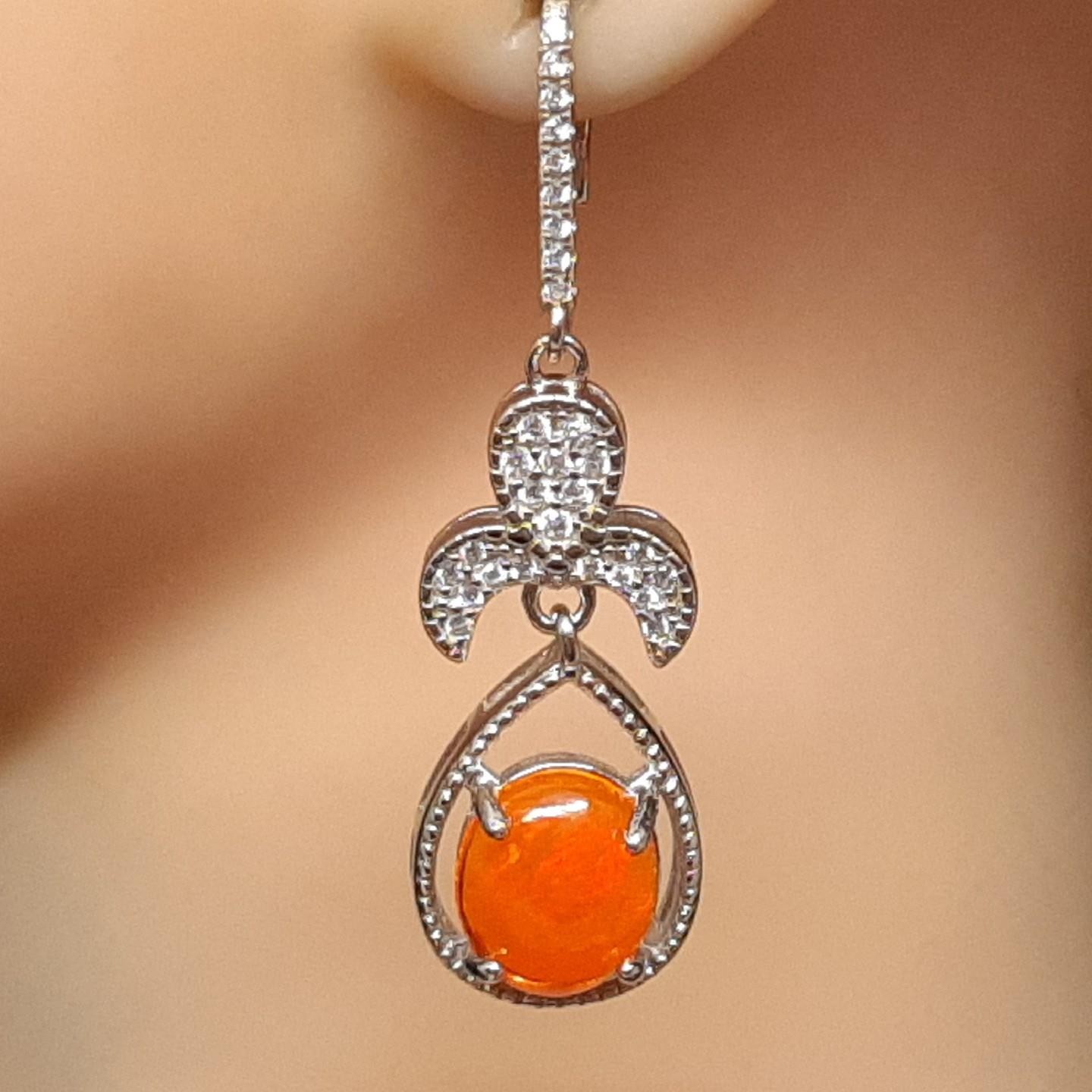 World Class 9.54ctw Orange Opal & White Sapphire 925 Silver Dangle Earrings