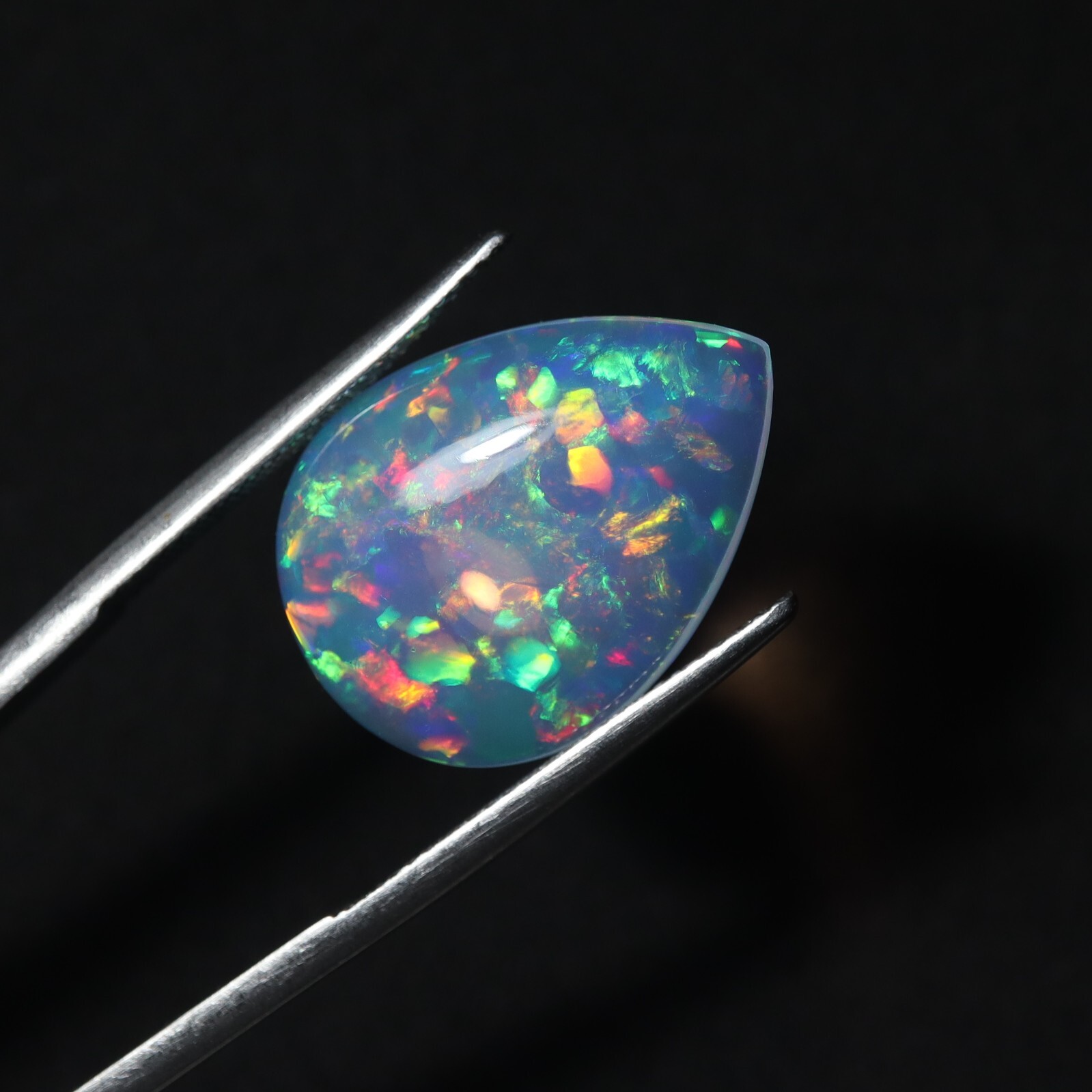 9 Carat 21.9×15.9 MM Natural AAAA Rainbow Fire Ethiopian Welo Opal Pear Shape