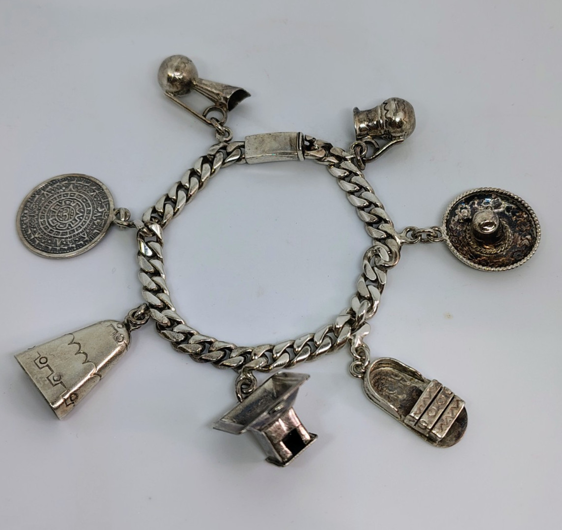 Antique 1940’s Mexico ERAS Sterling Silver 925 Bracelet 7 Charm 43.3g