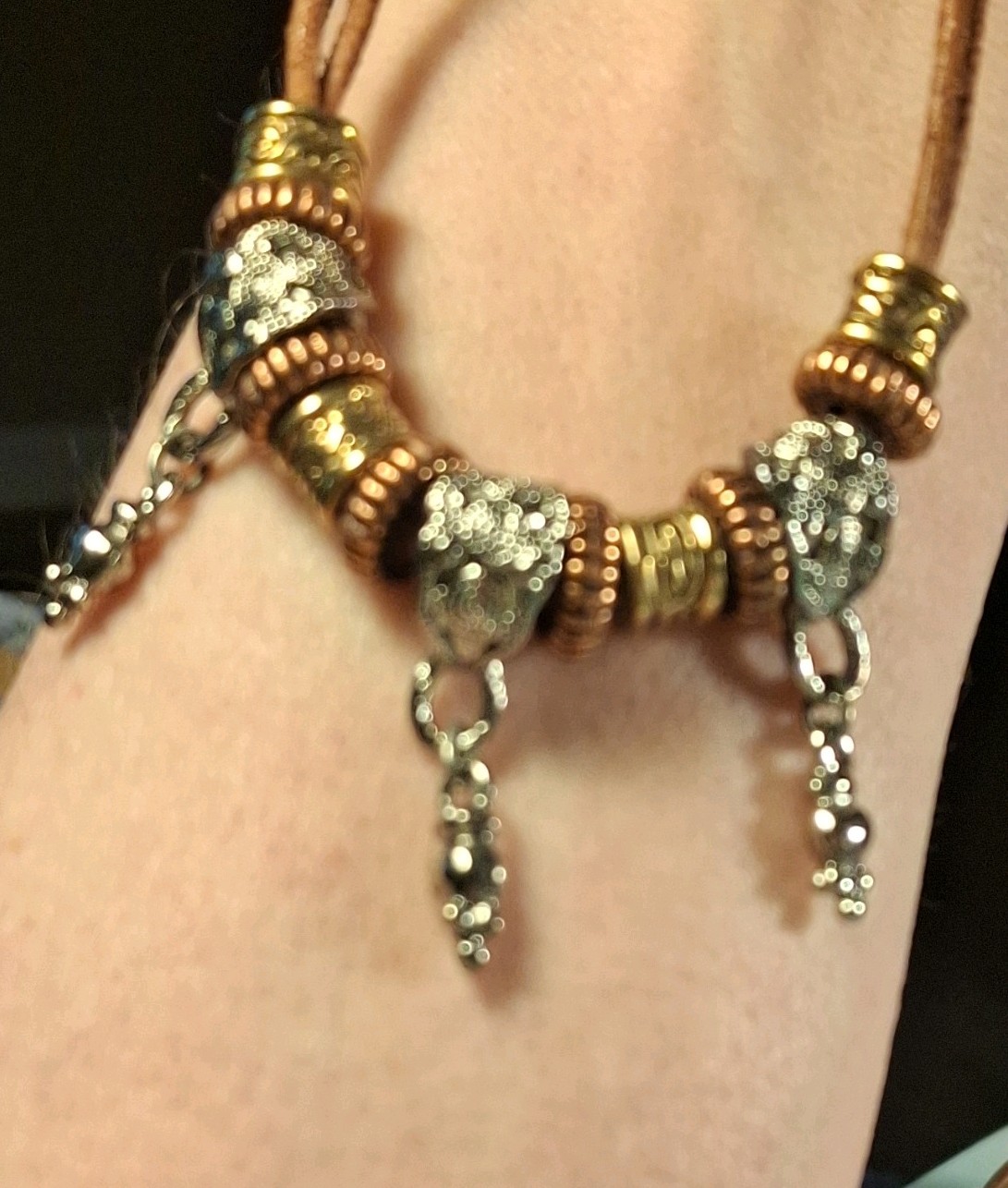 Robert Rose signed pre-owned necklace with brown cord & 3 tone ornate beads